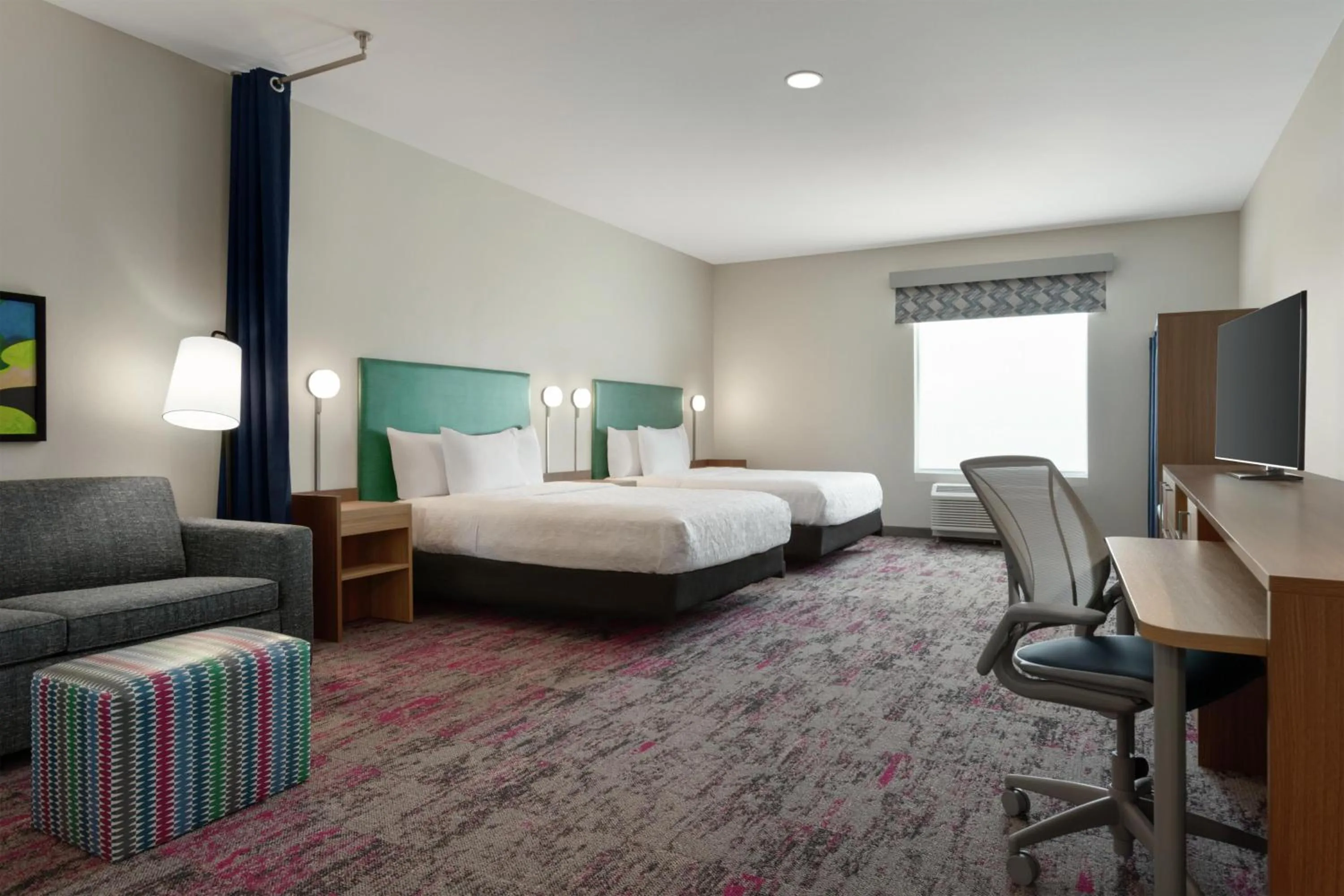 Living room, Bed in Home2 Suites By Hilton Denton