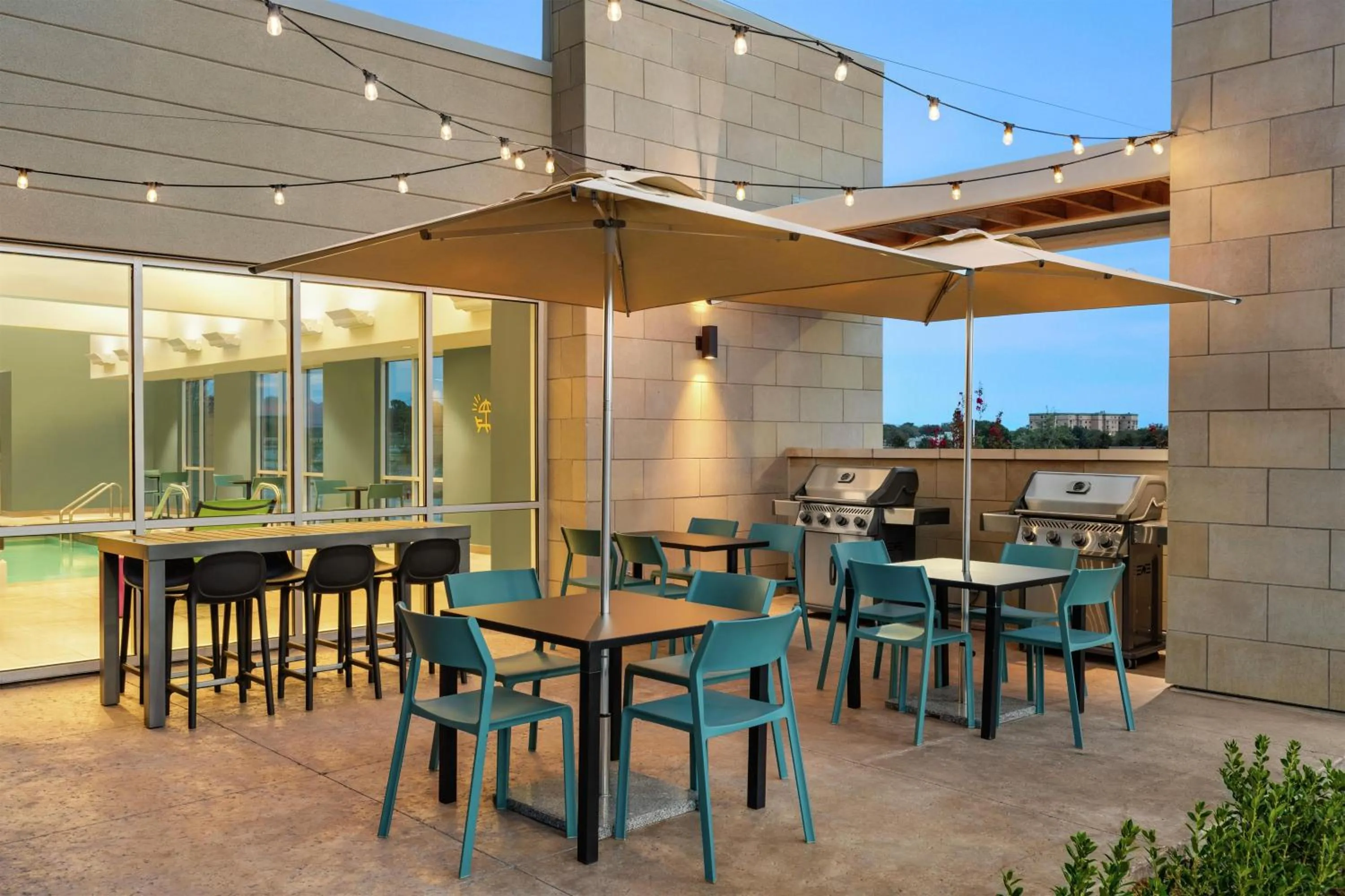 Patio in Home2 Suites By Hilton Denton