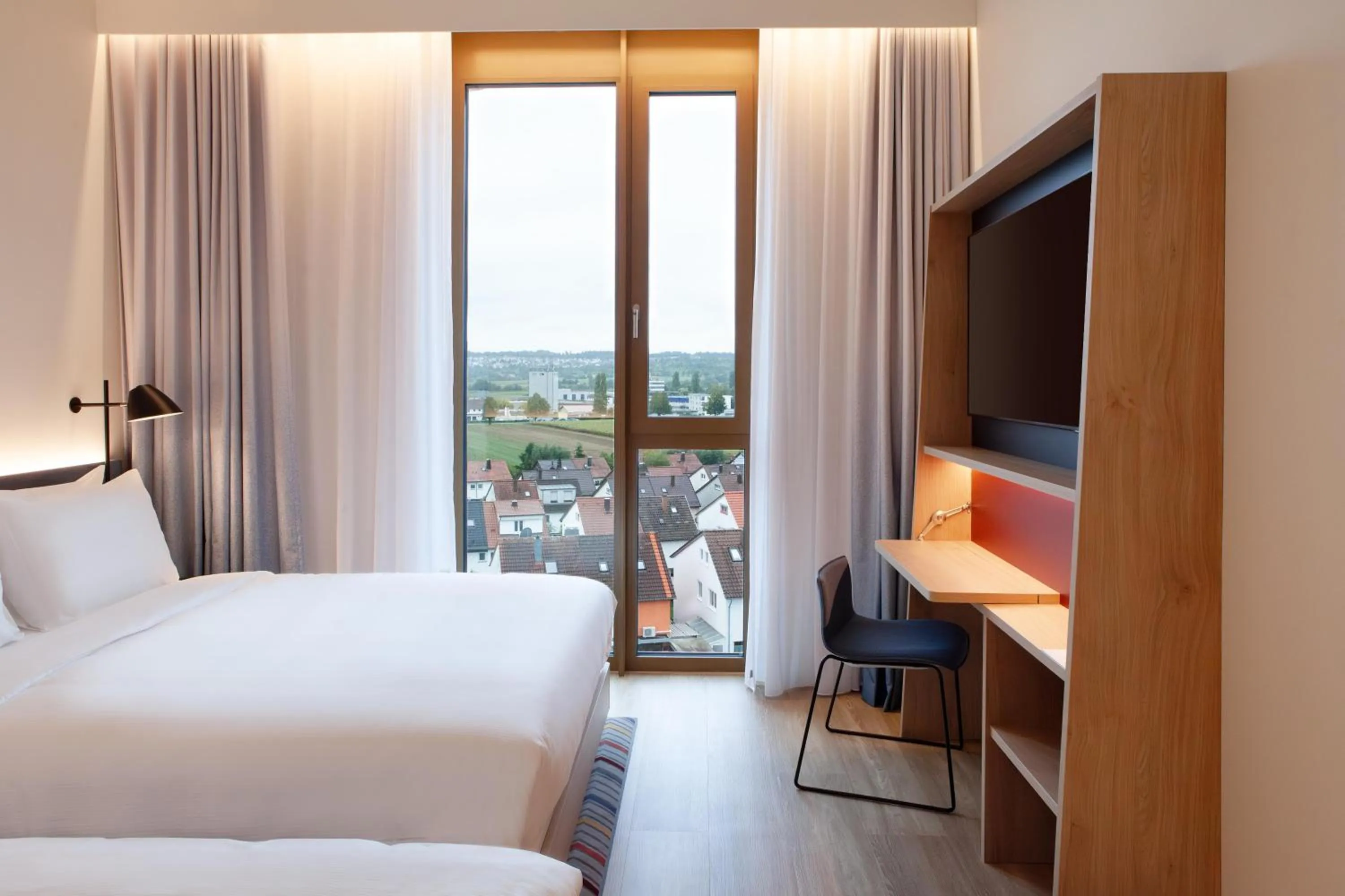 Bedroom, Bed in Hampton By Hilton Stuttgart Airport