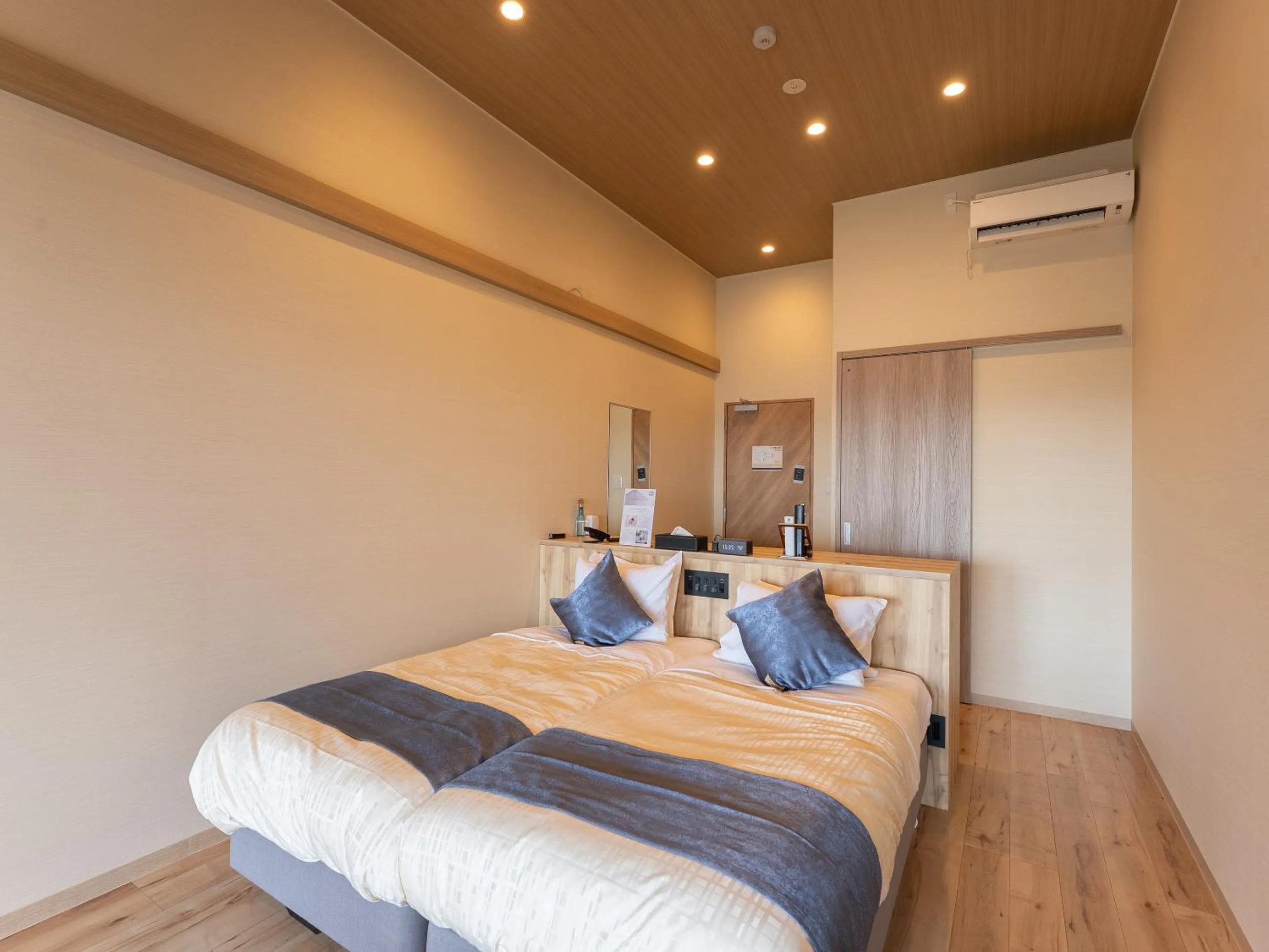 Bed in Livemax Resort Inami Seafront