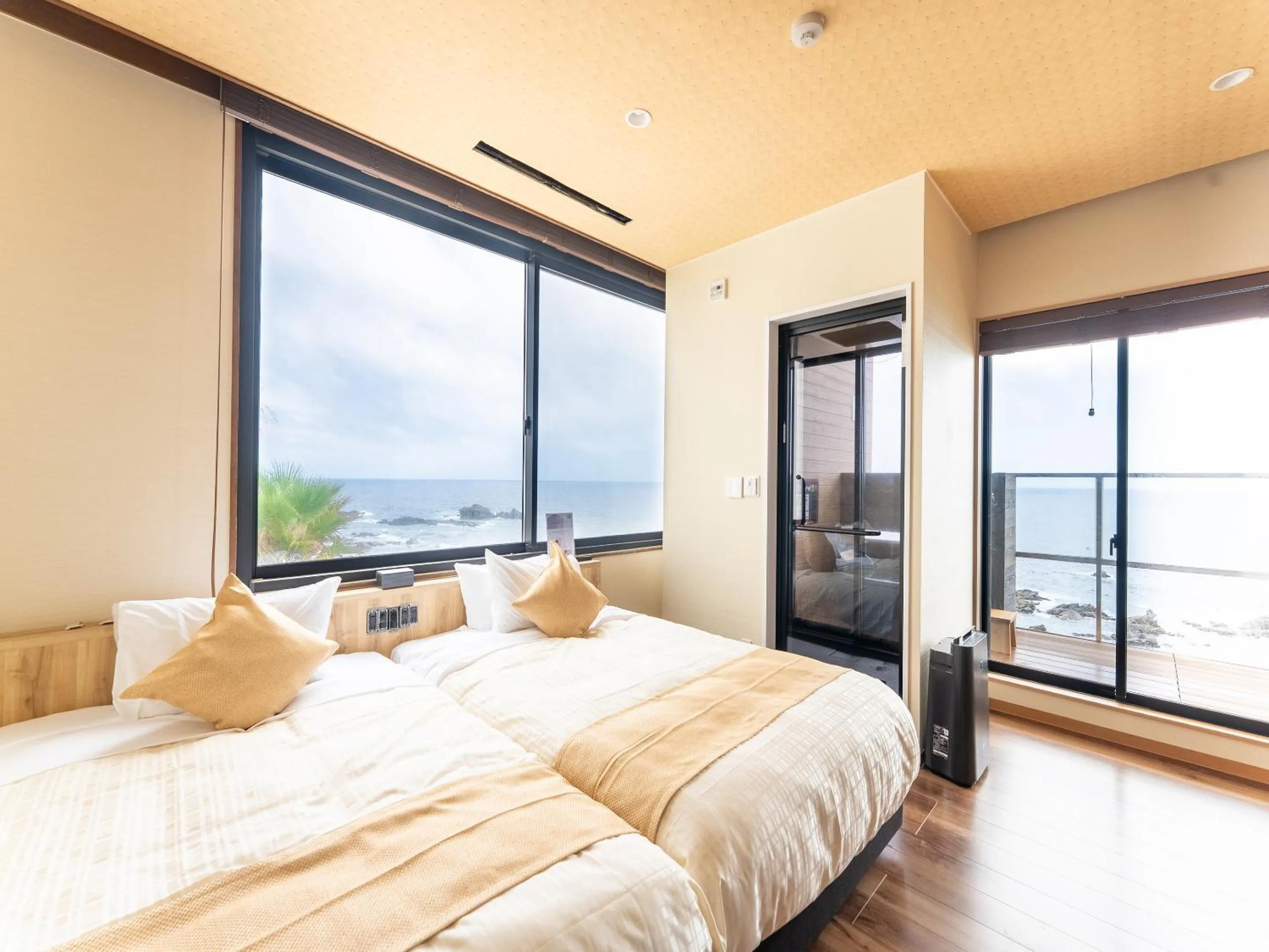 Bed in Livemax Resort Inami Seafront