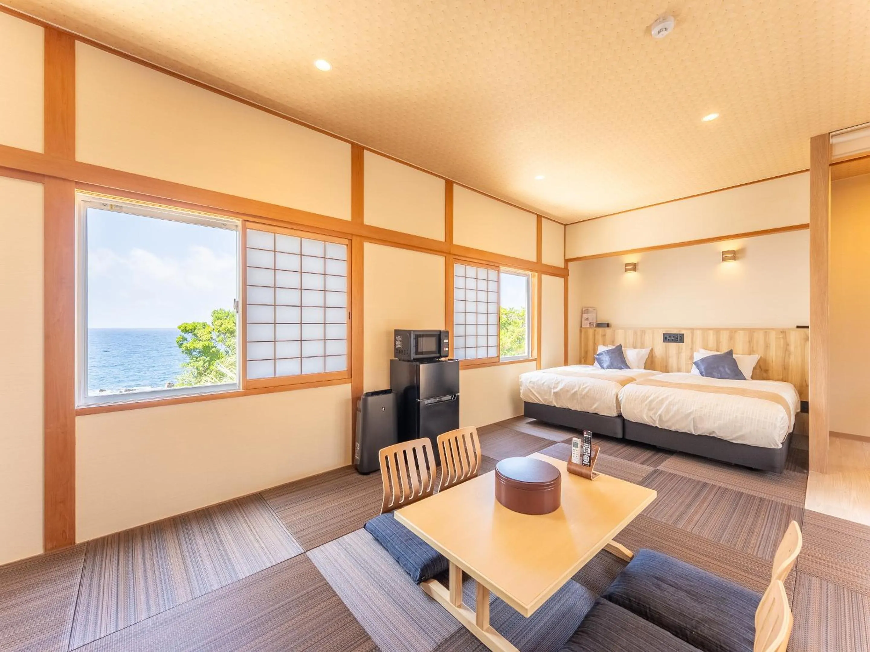 Bed in Livemax Resort Inami Seafront