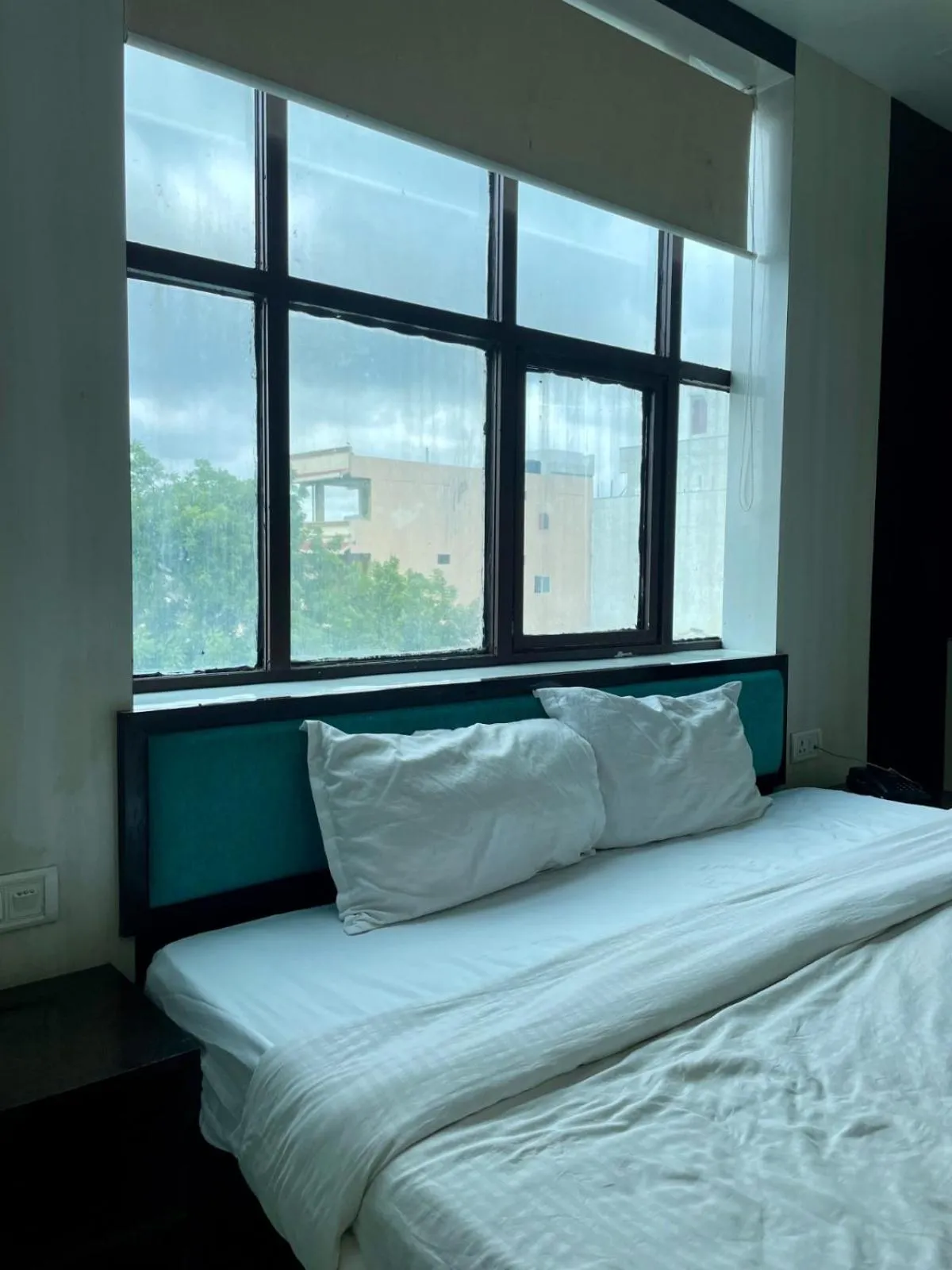 Photo of the whole room, Bed in Hotel Komal Palace Anand Nagar