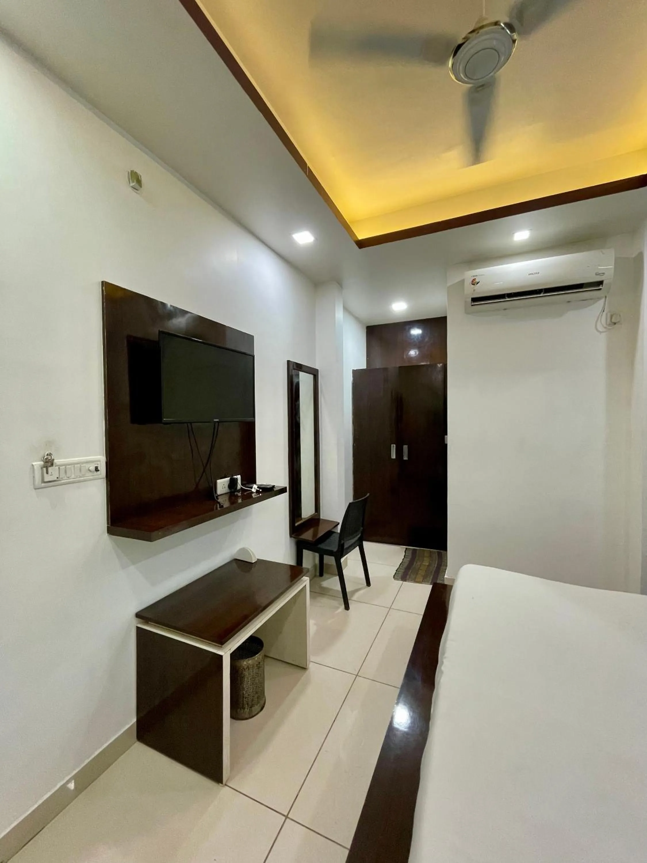 air conditioner, Bed in Hotel Komal Palace Anand Nagar