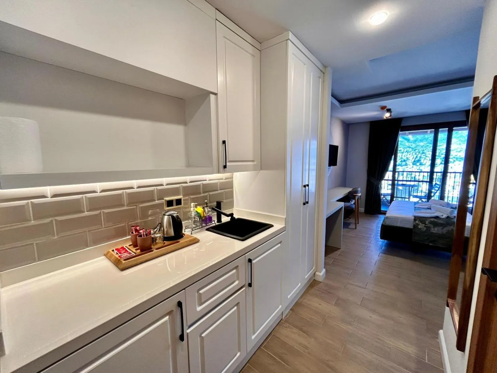 Kitchen or kitchenette in Castello By Mediterra Hotel