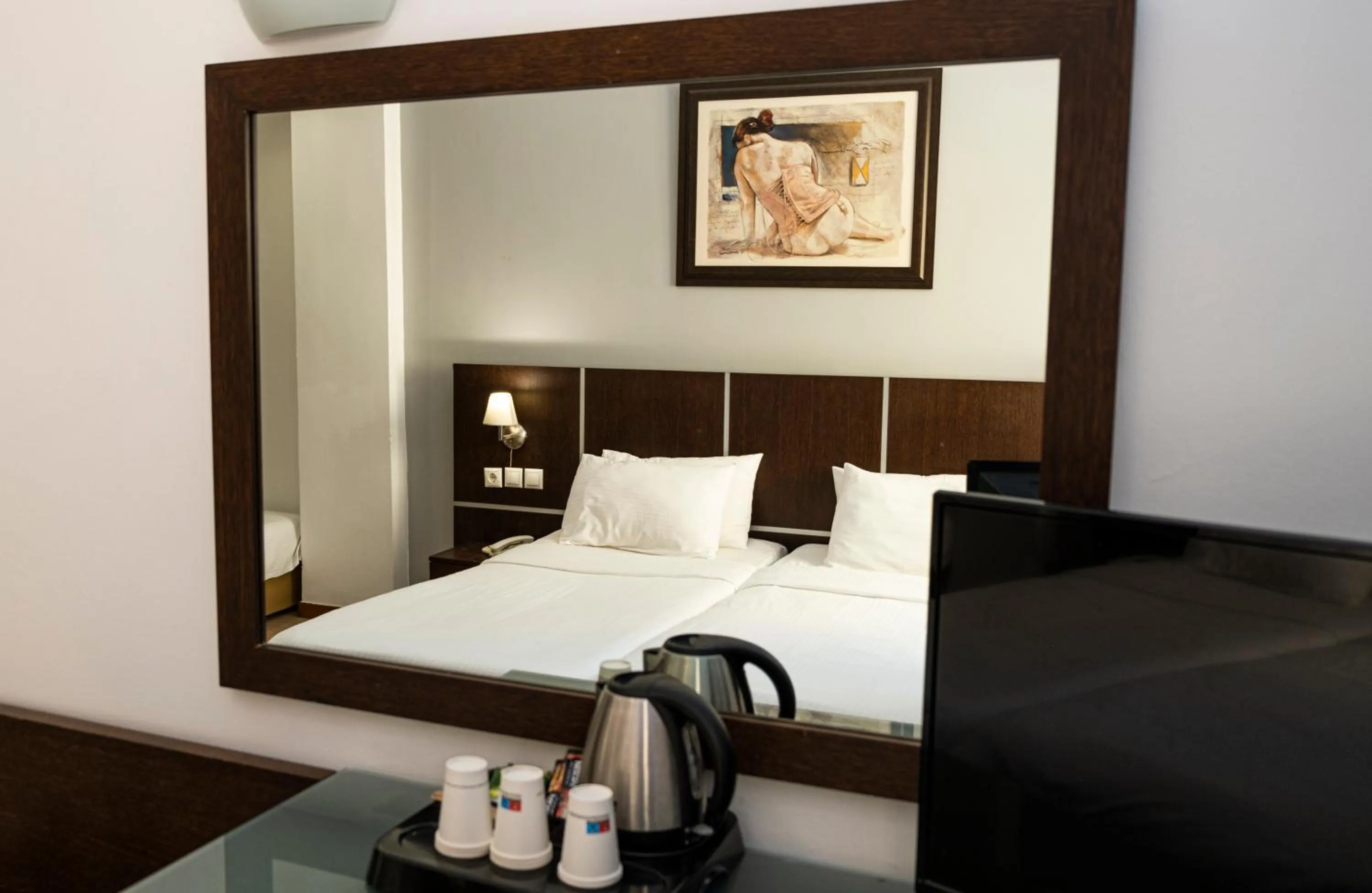 Bed in Blue Sea Hotel Alimos