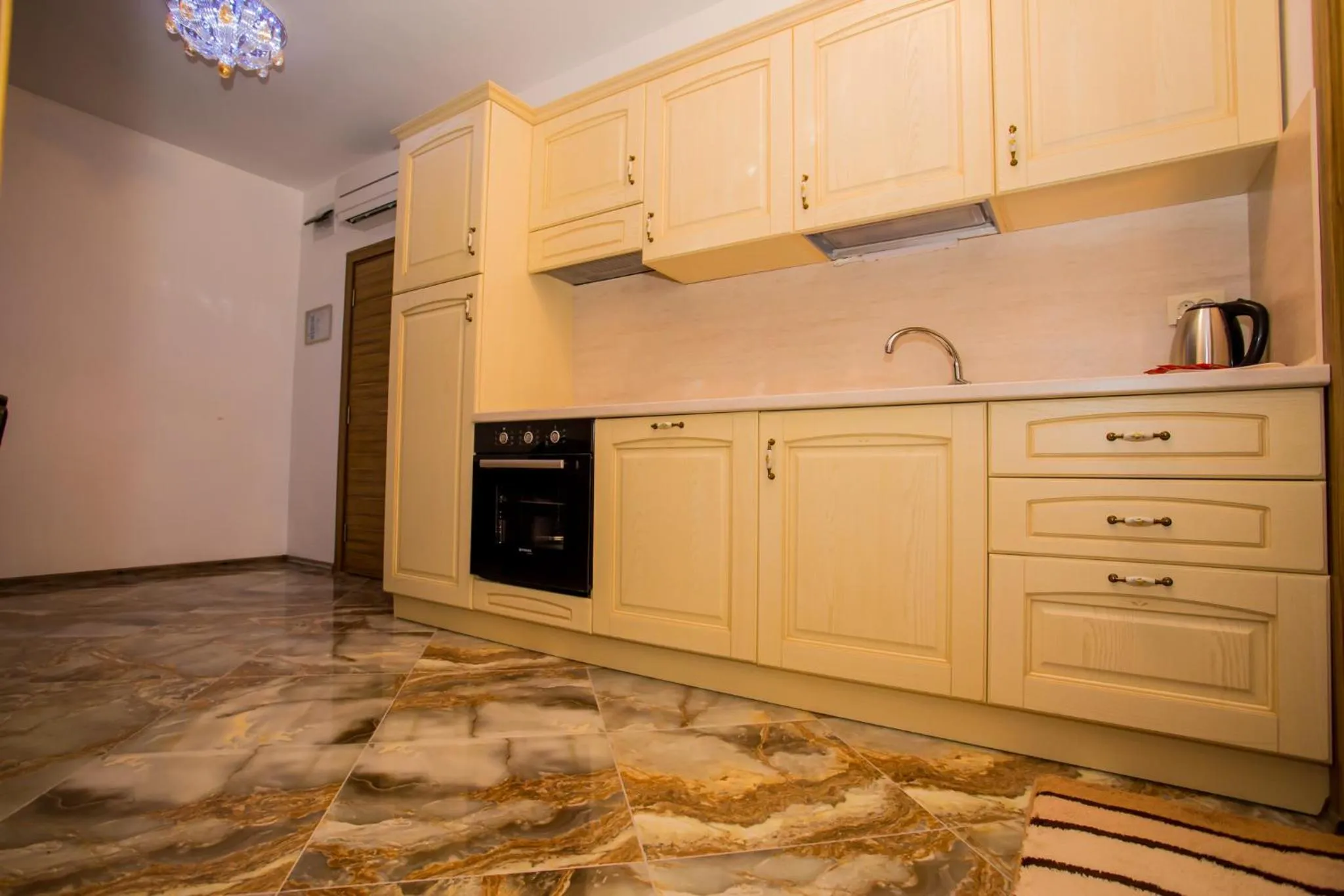 Kitchen or kitchenette in Boutique Apart Hotel Versis