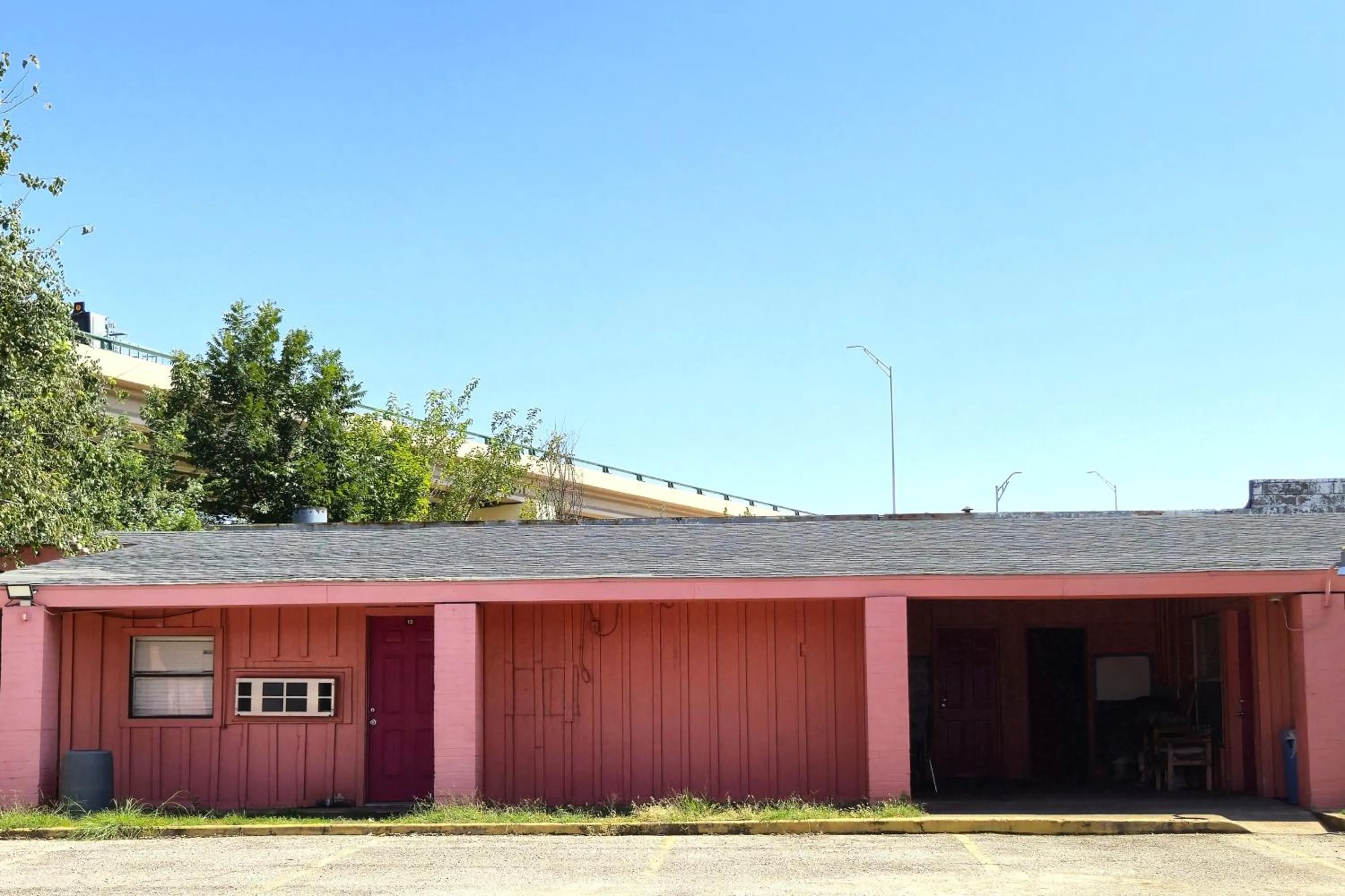 Property building in Way Side Inn by Hotel O Dallas near Fair Park Downtown