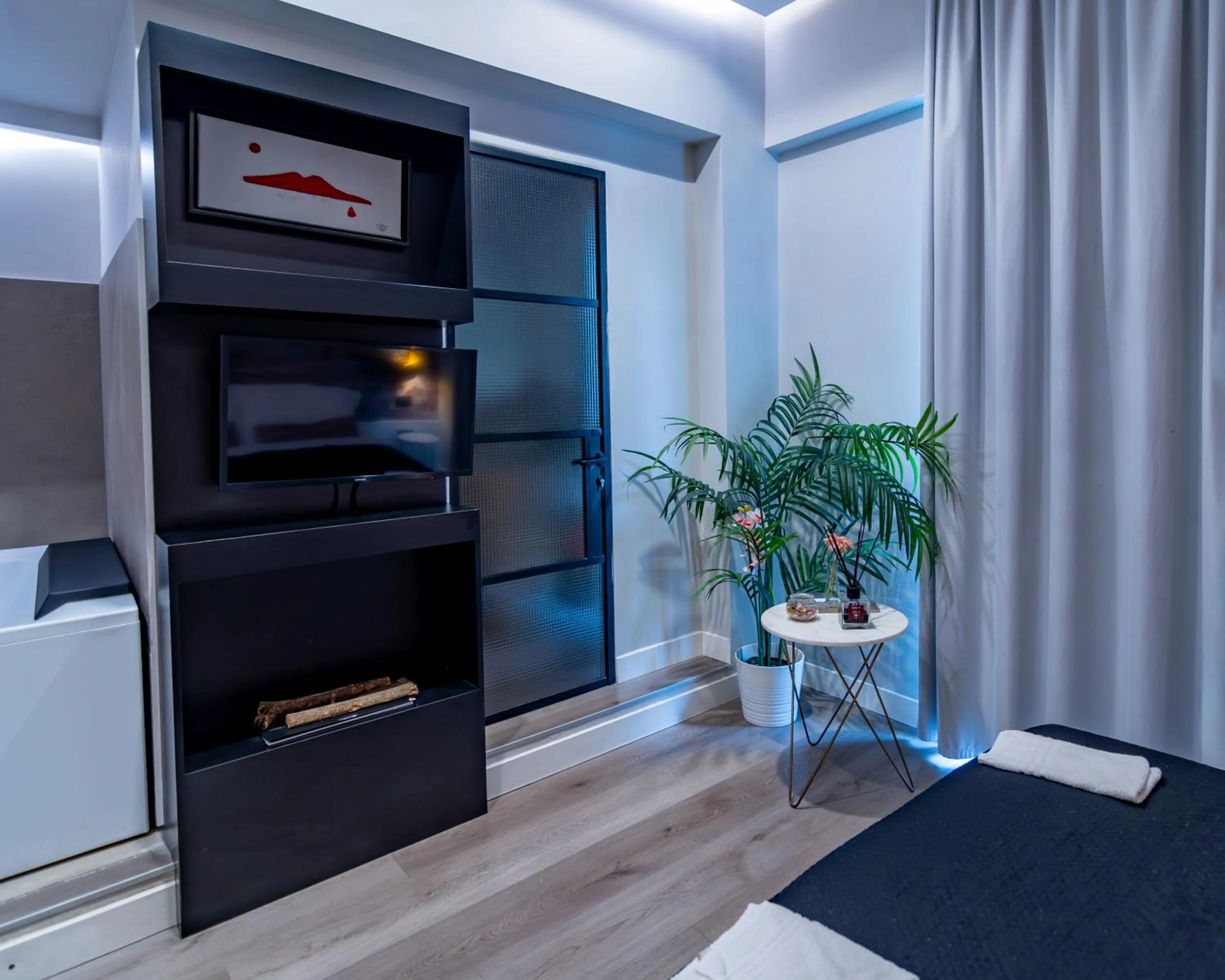 Bed in VESUVIANUS Rooms and More