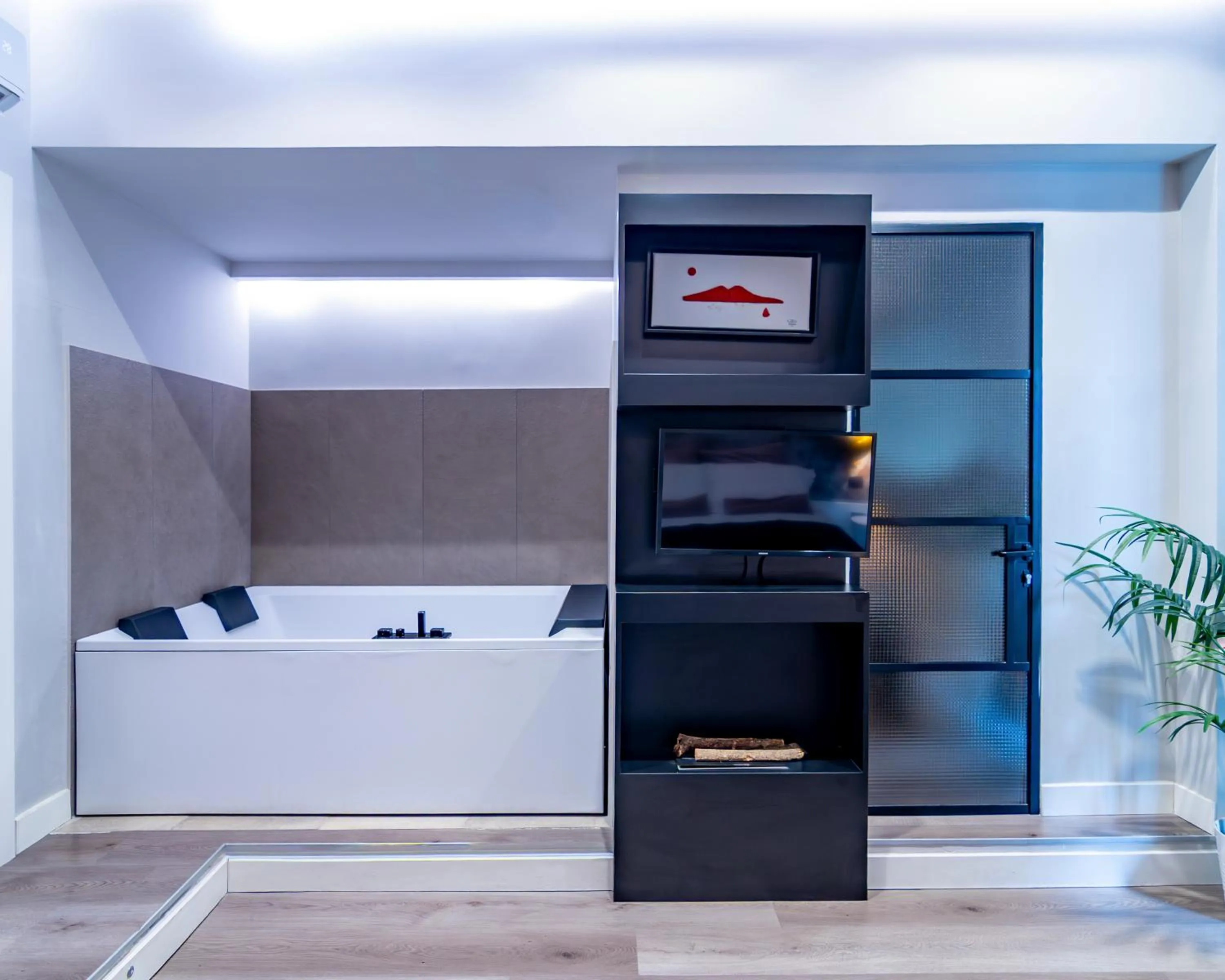 Bed in VESUVIANUS Rooms and More