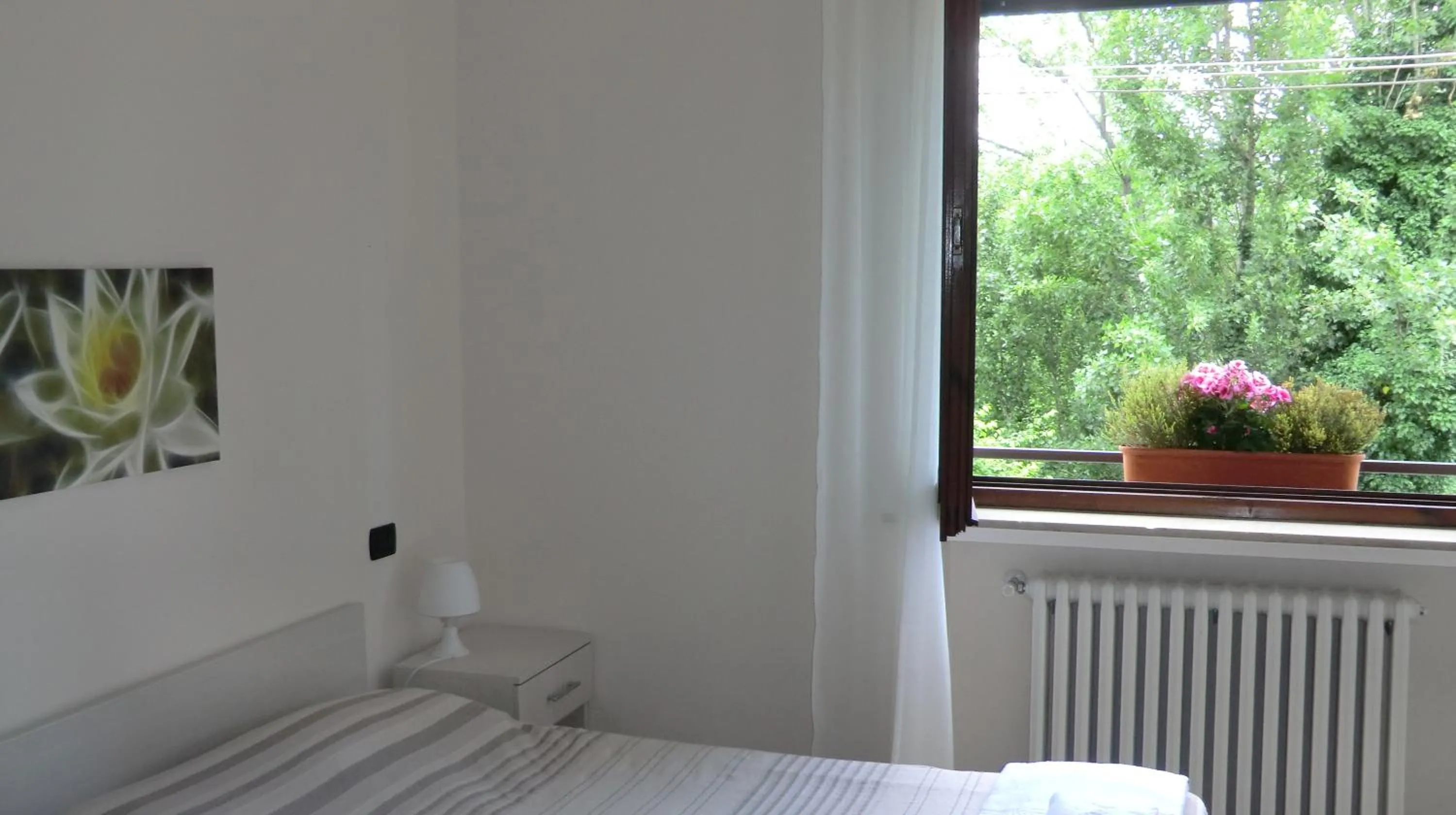 Bedroom in Maura appartamenti