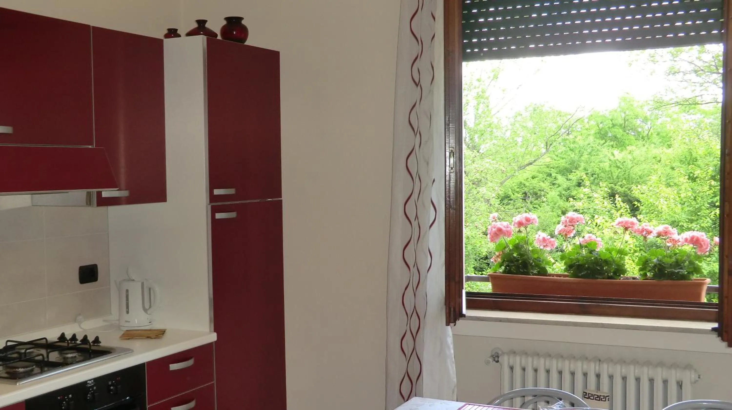 Kitchen or kitchenette in Maura appartamenti