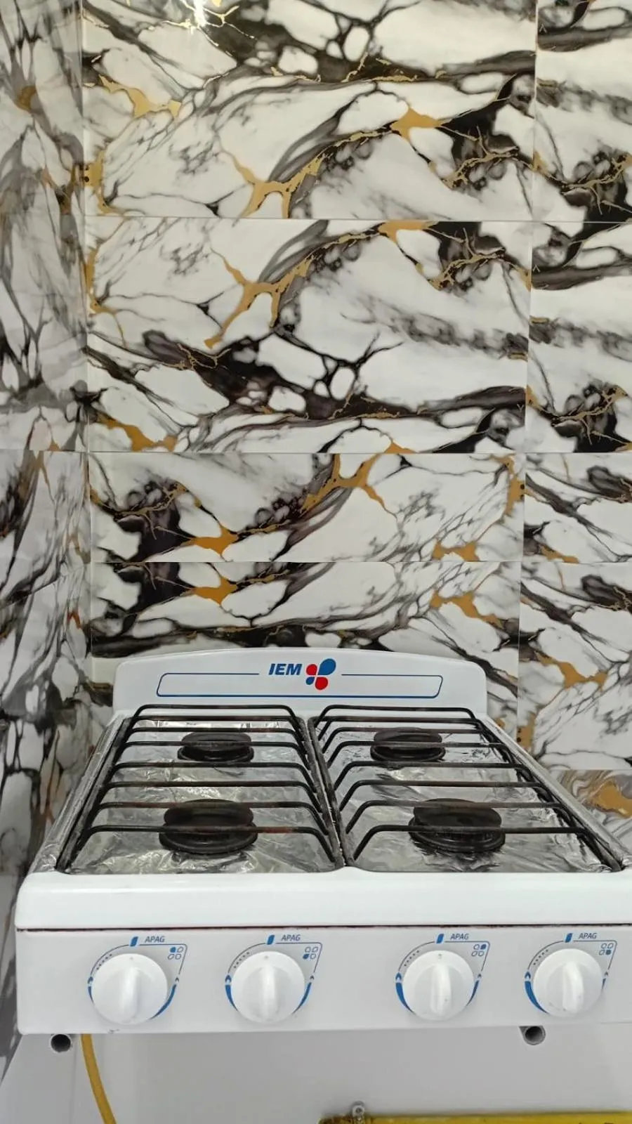 Kitchen or kitchenette in Hostal Maple