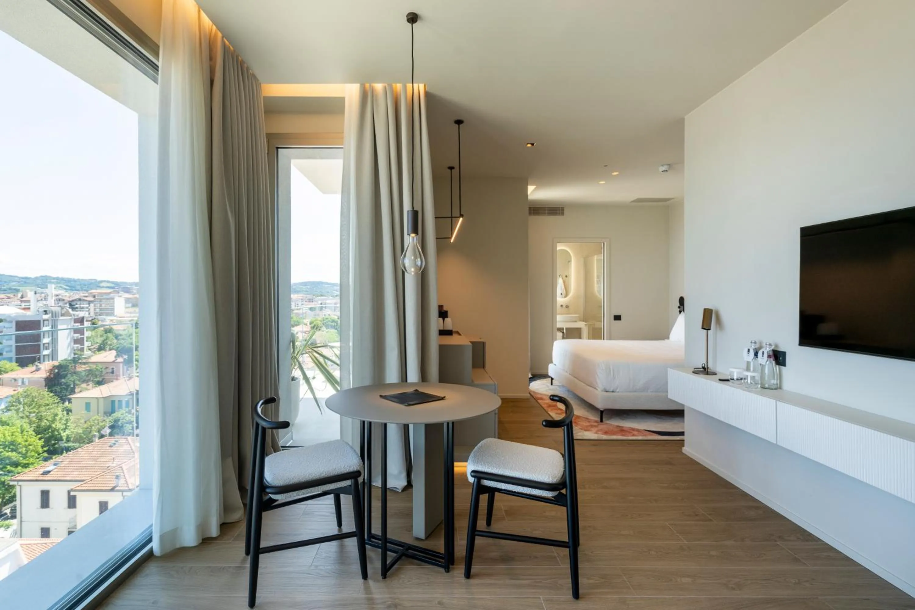 Bed in Opera Suite Hotel Pesaro