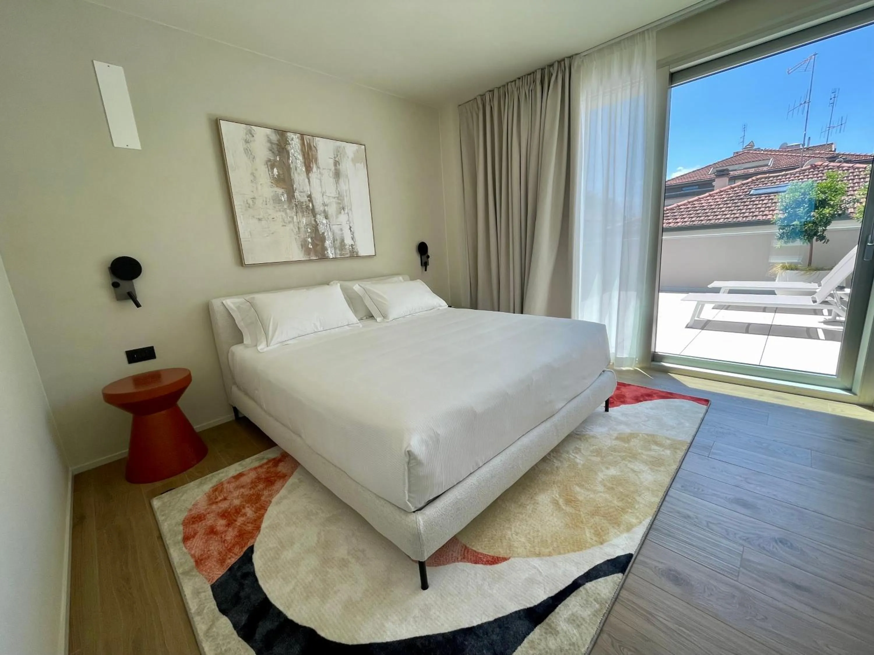 Bed in Opera Suite Hotel Pesaro