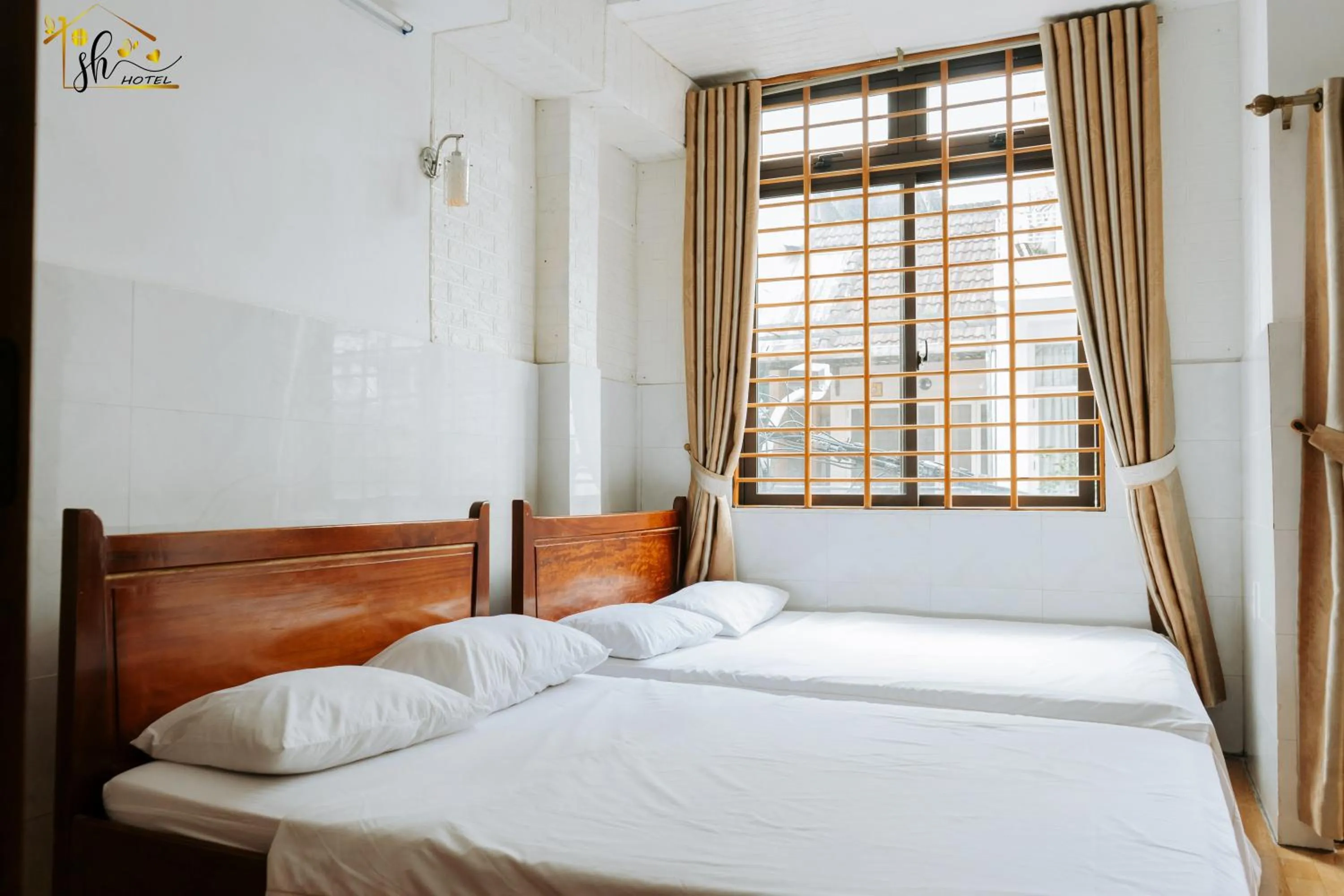 Photo of the whole room, Bed in SH Hotel