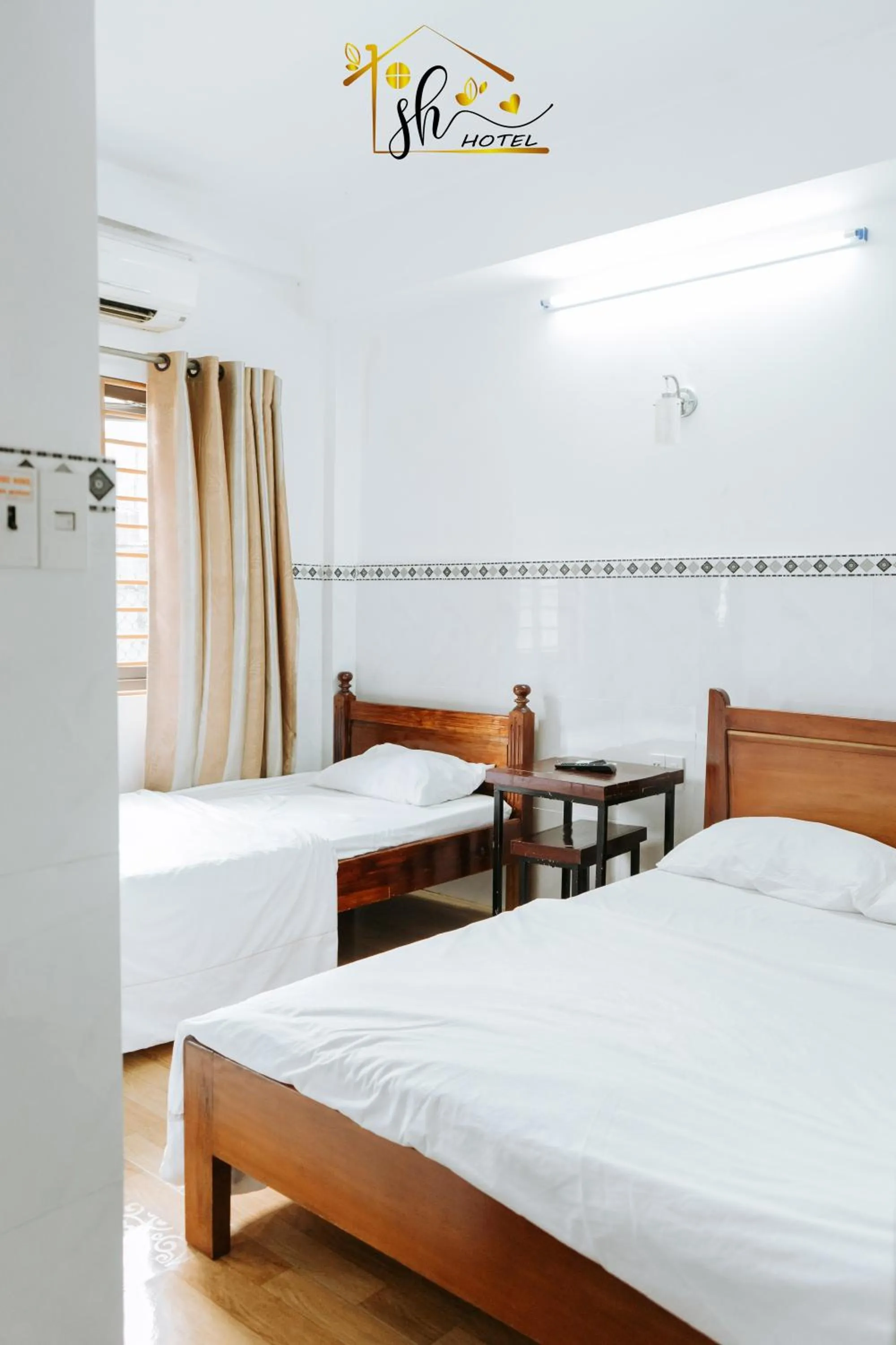 Photo of the whole room, Bed in SH Hotel