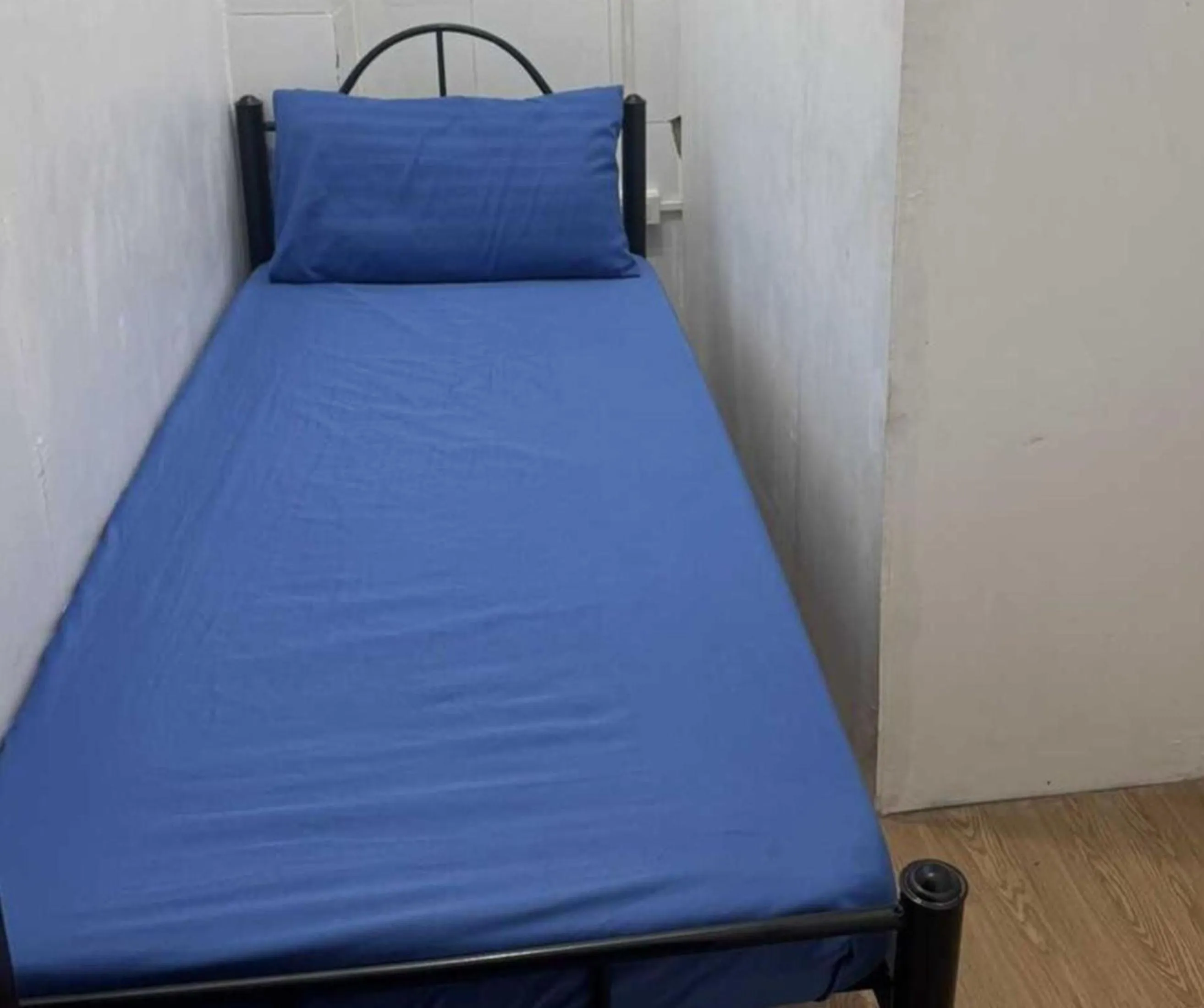 Bed in OYO 1155 Carnivale Inn