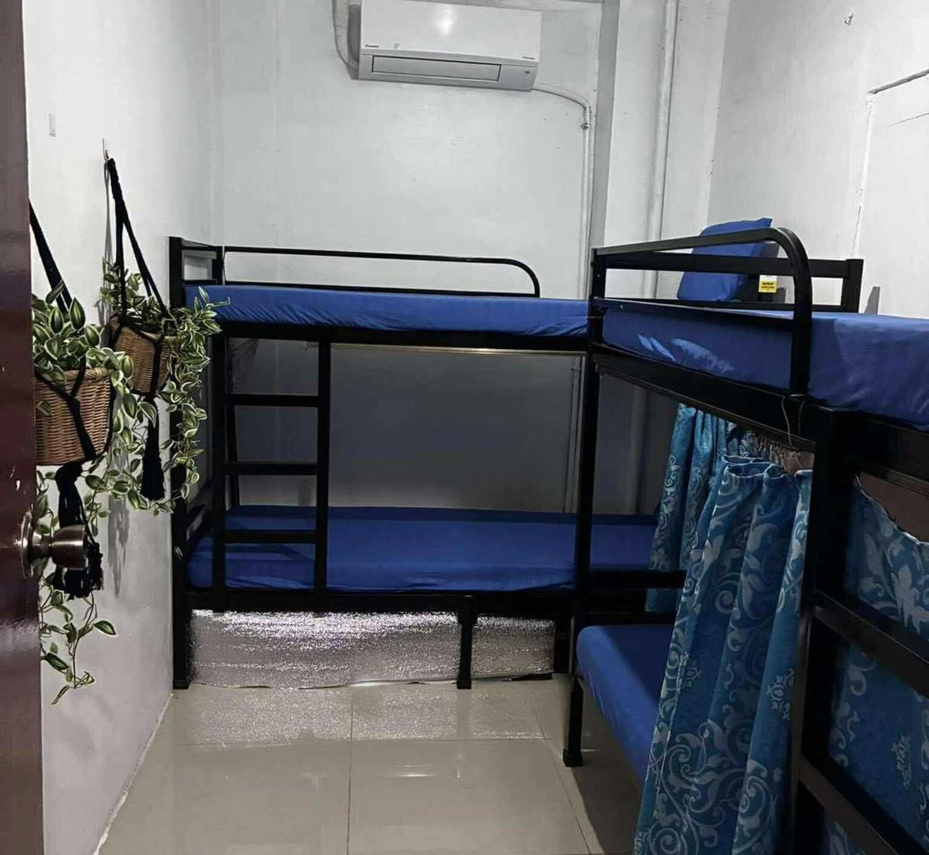 Bedroom, Bed in OYO 1155 Carnivale Inn