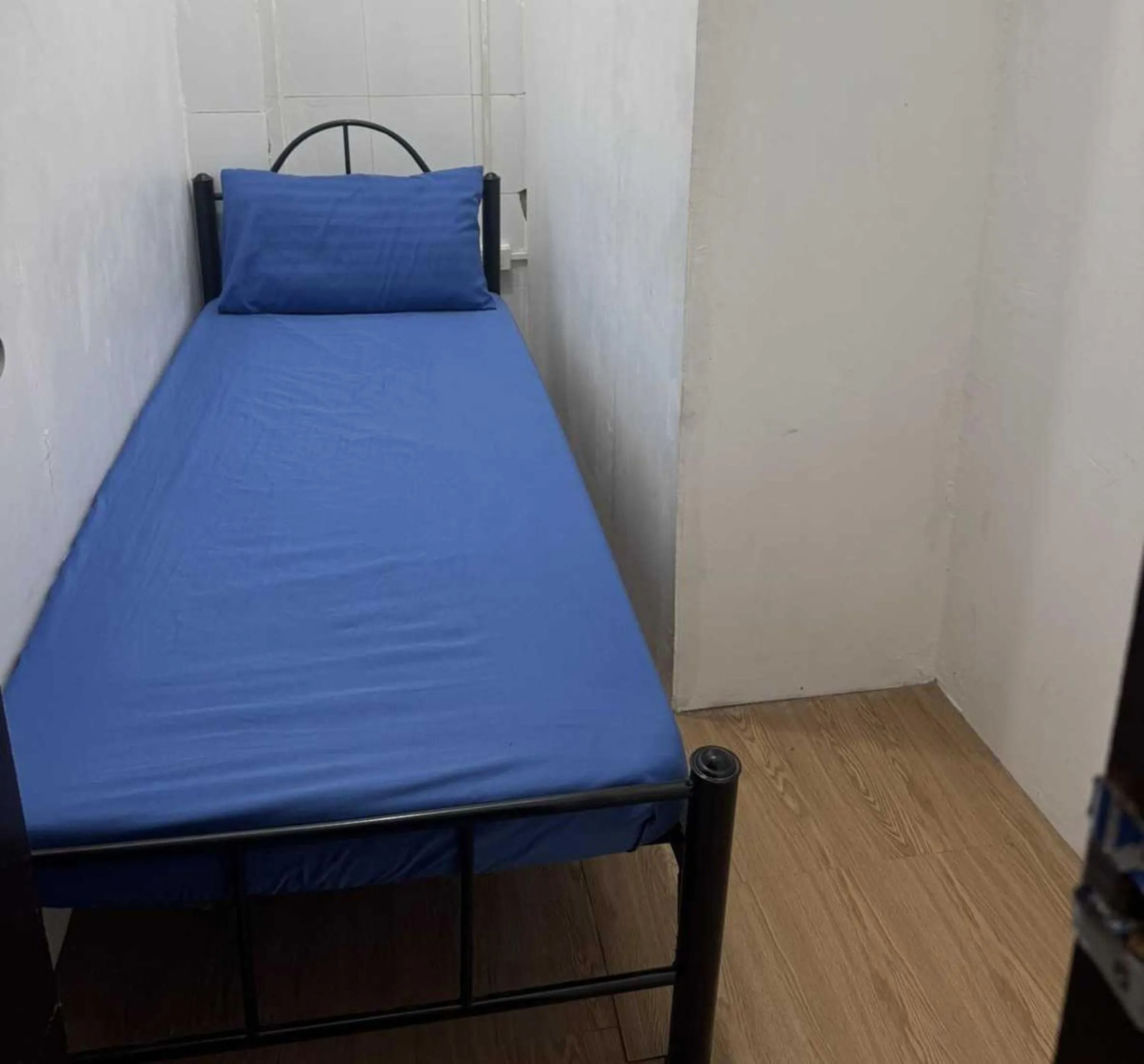 Bed in OYO 1155 Carnivale Inn