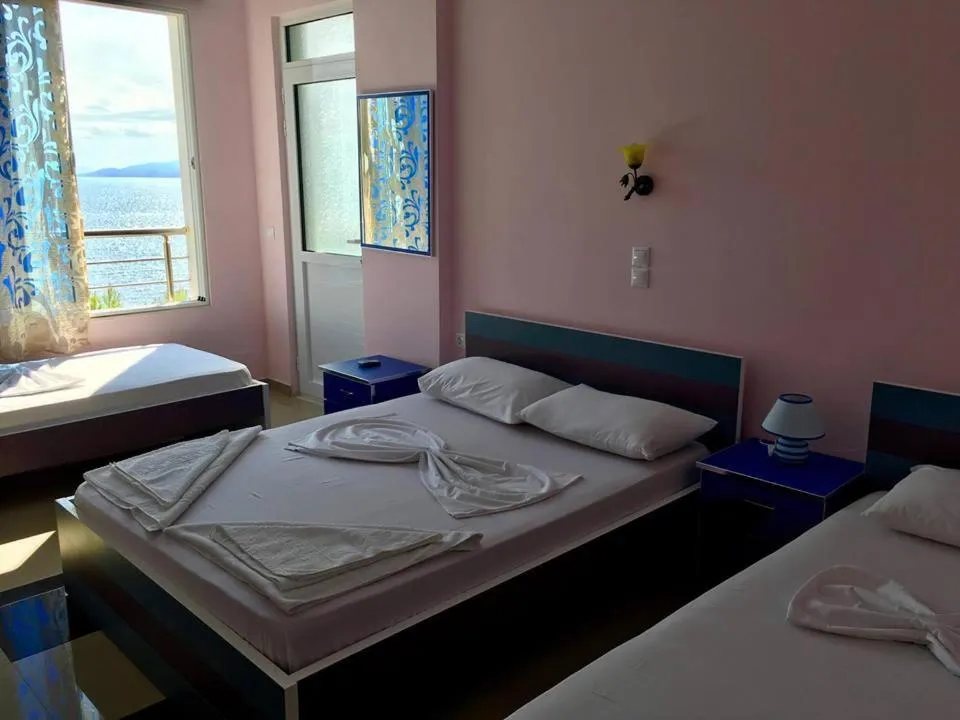 Bed in Kalemi's Beachside Hotel