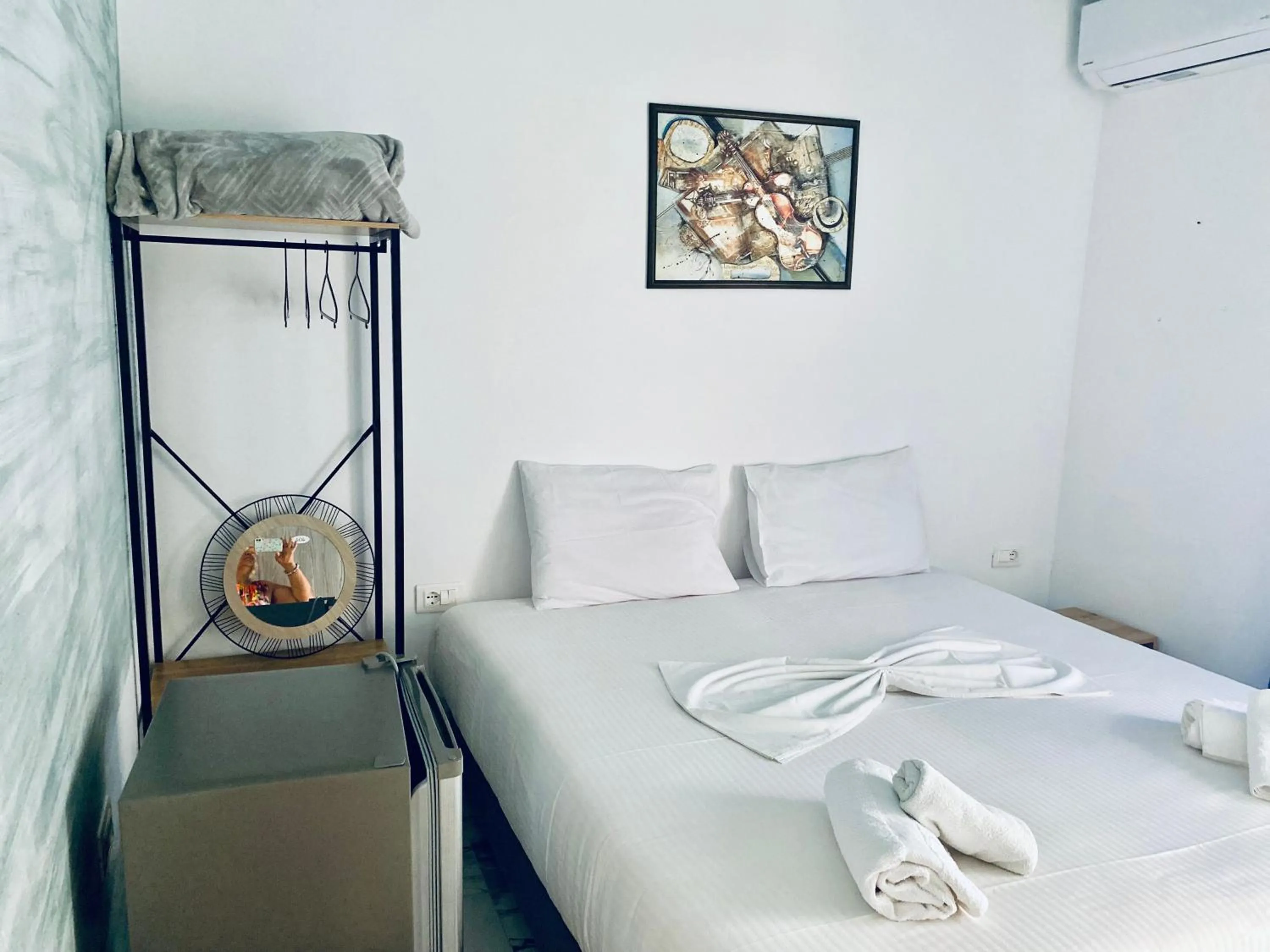 Bed in Kalemi's Beachside Hotel