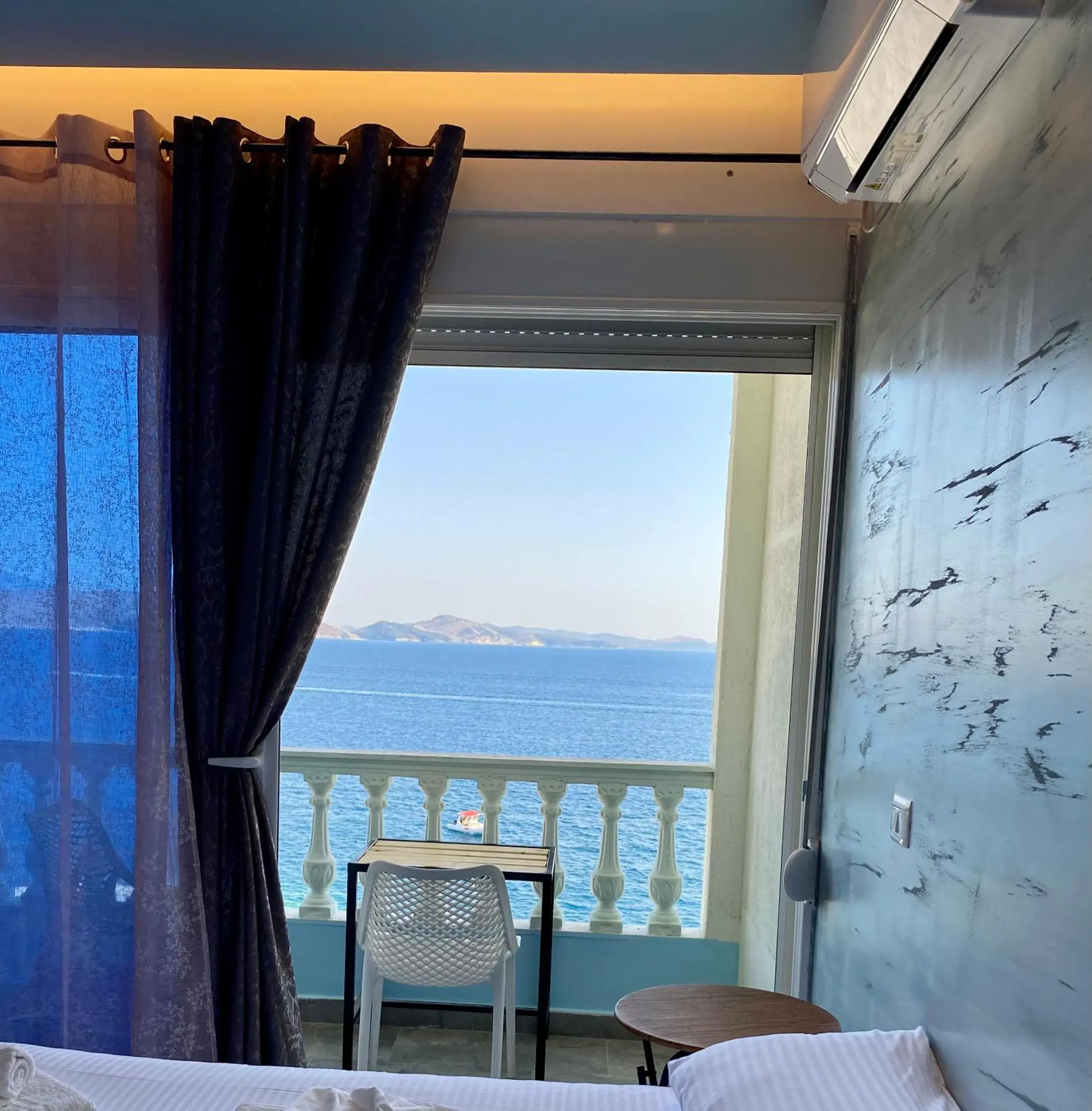 Triple Room with Sea View in Kalemi's Beachside Hotel Triple Room with Sea View in Kalemi's Beachside Hotel