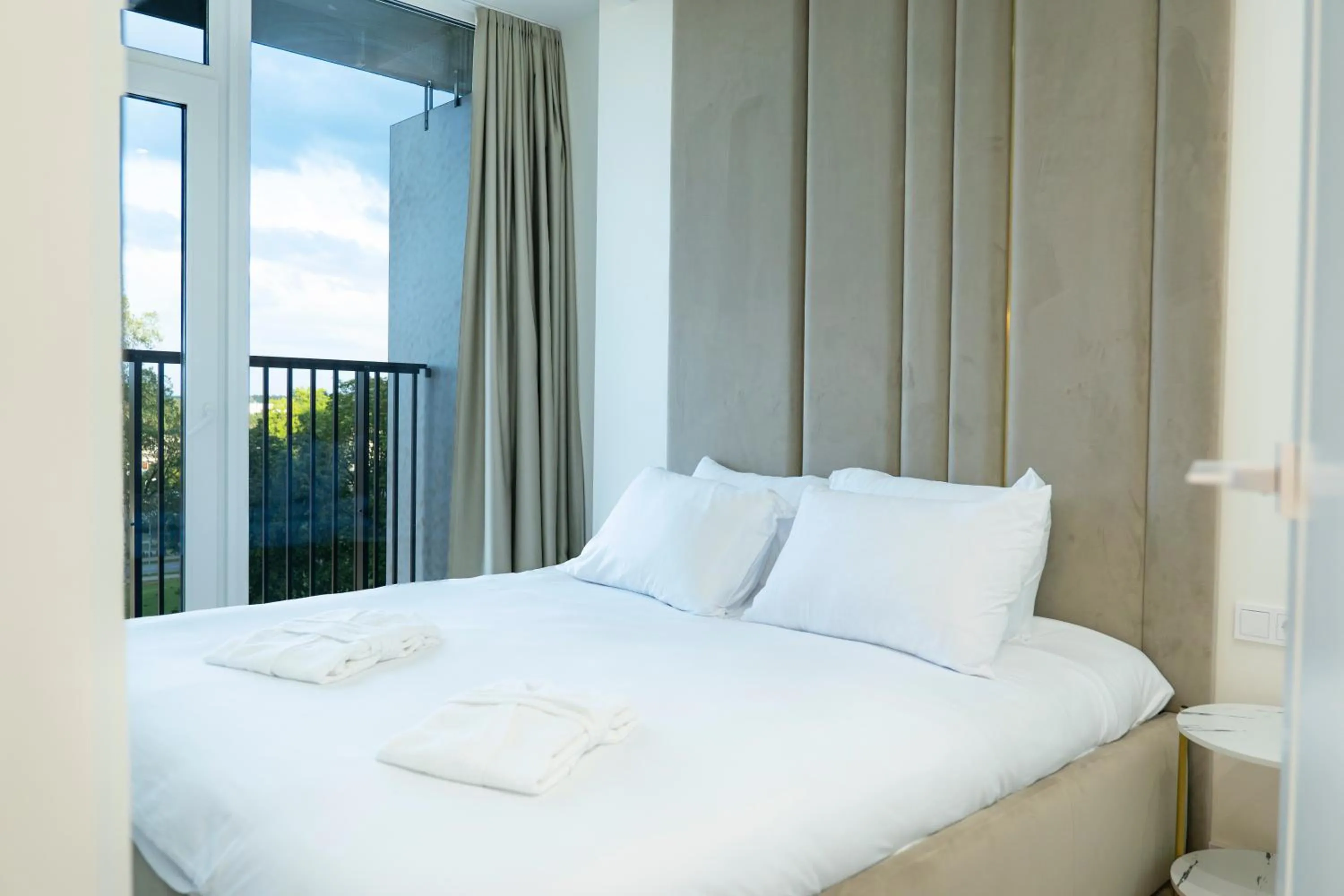 Bed in Aparthotel Nemunas