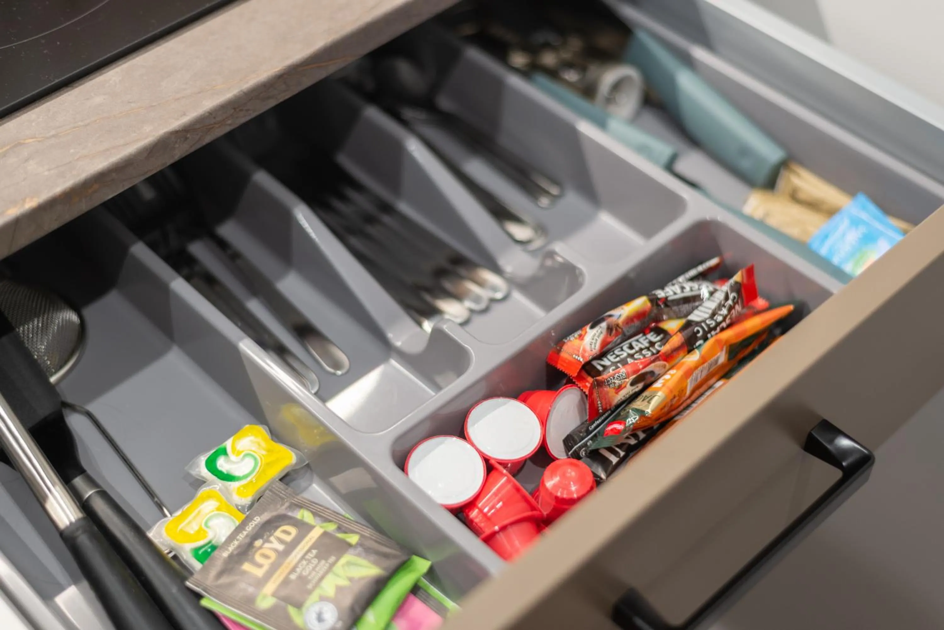 Kitchen or kitchenette in Aparthotel Nemunas