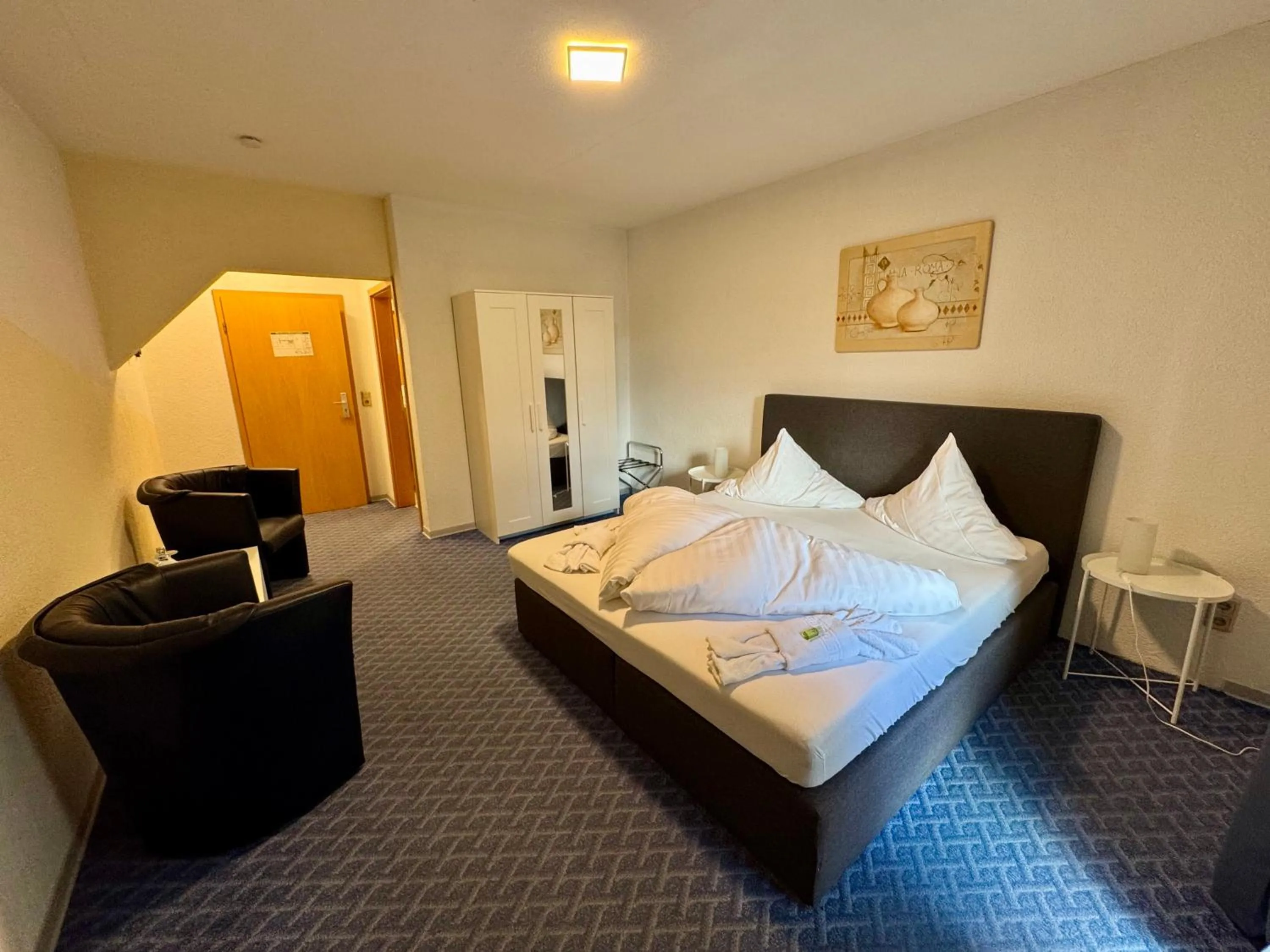 Living room, Bed in Hotel-Restaurant Christine