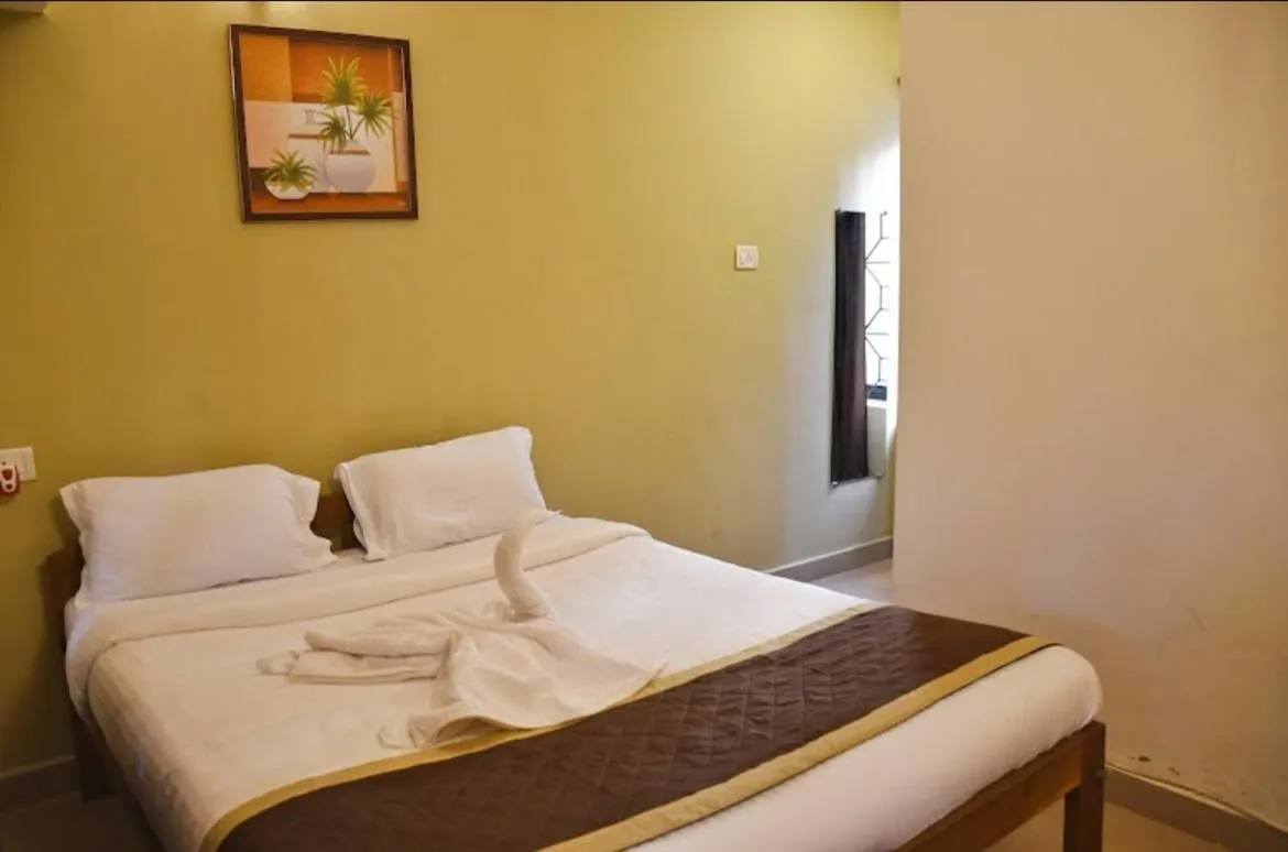 Bed in Kartik Resort