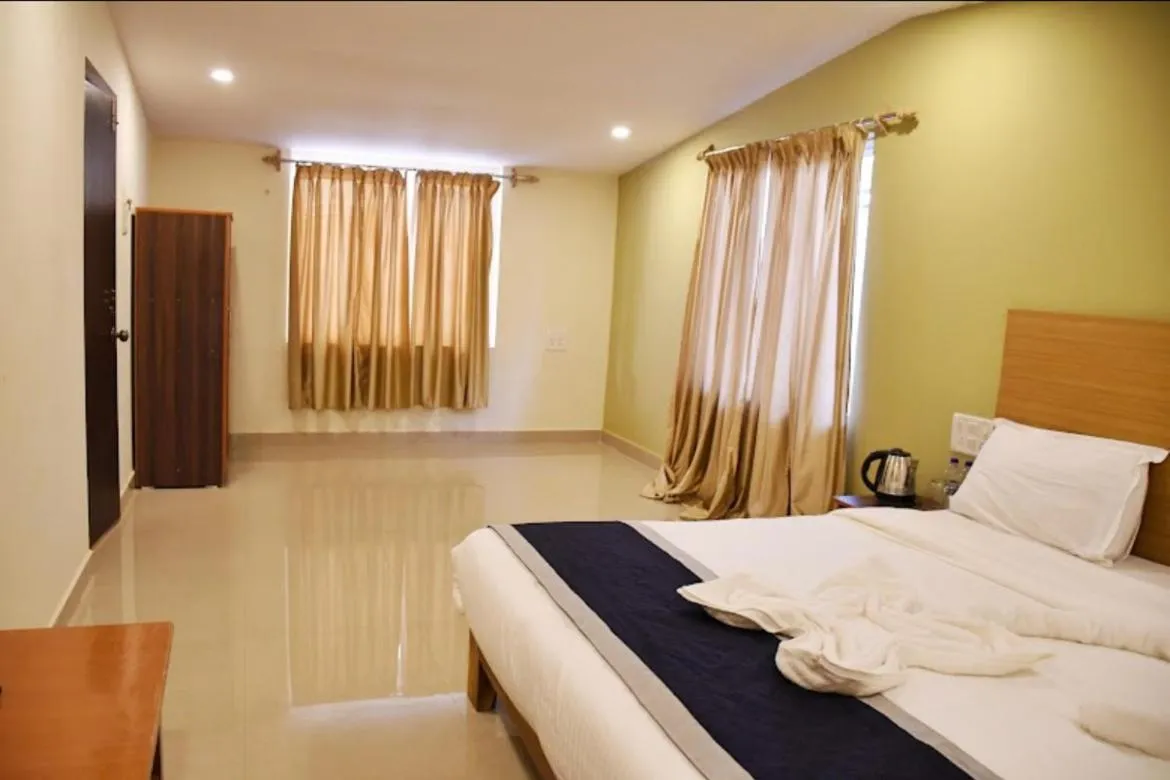 Bed in Kartik Resort