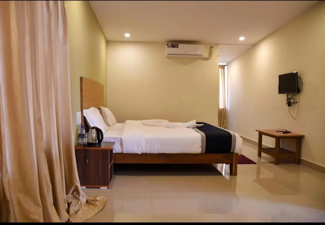 Bed in Kartik Resort