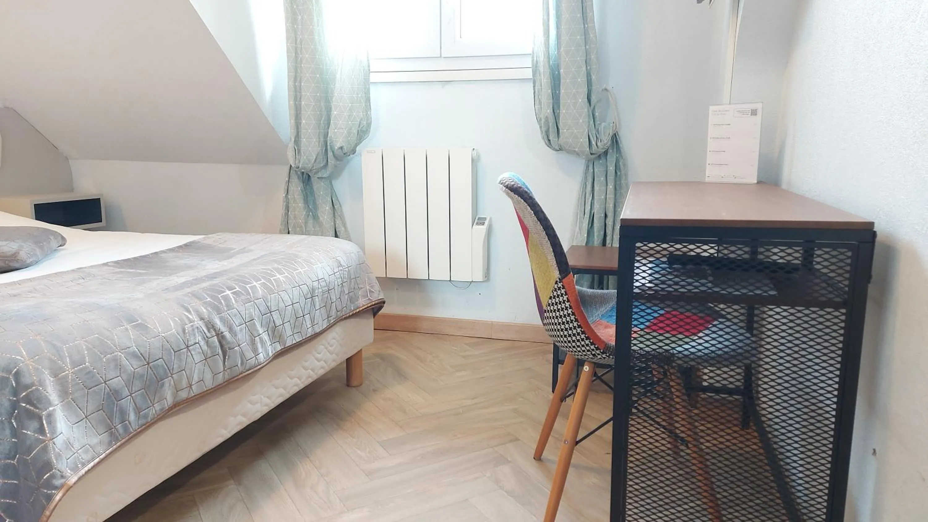 Photo of the whole room, Bed in Logis Hôtel Vannes Nord Le Clos Des Hortensias