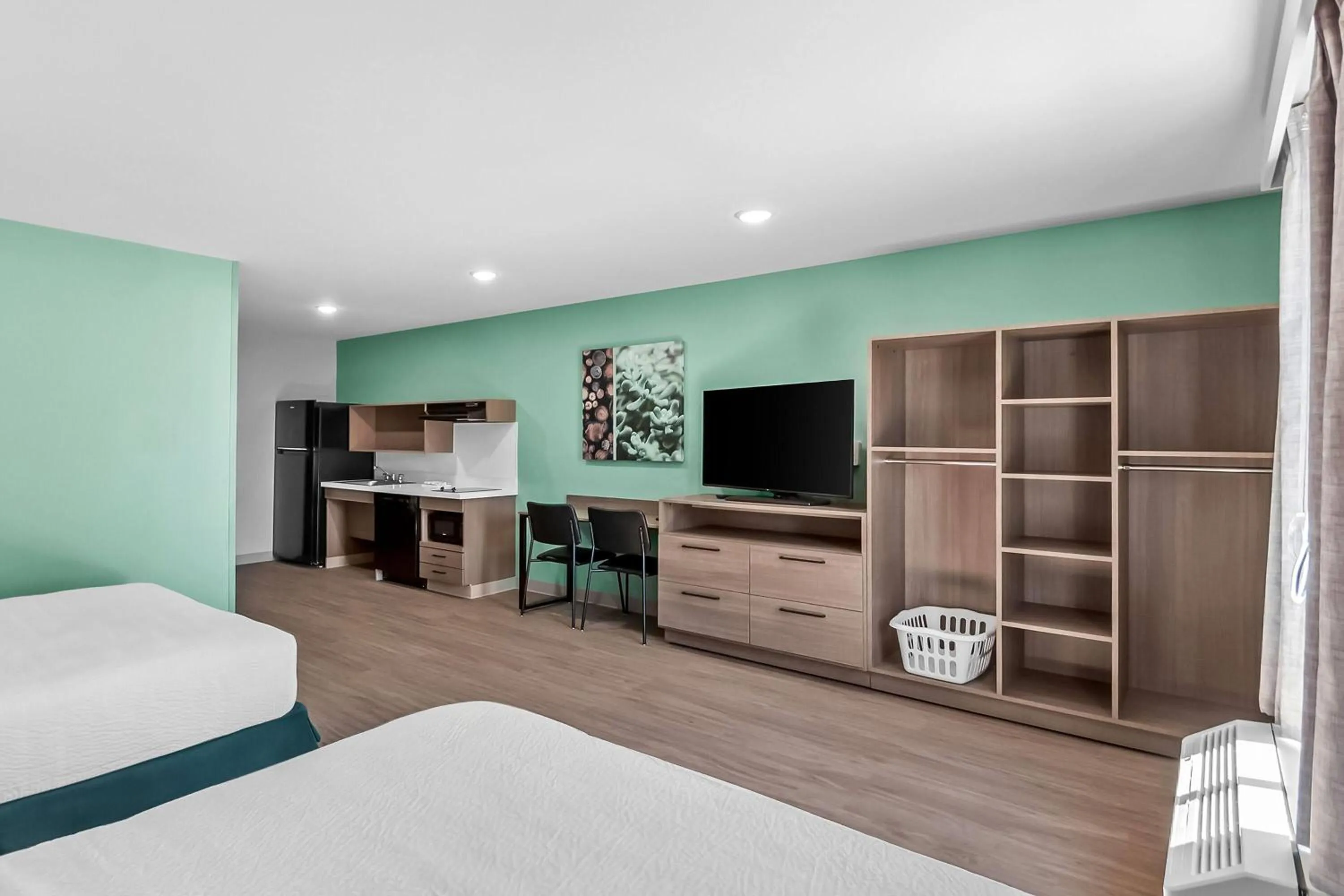 Bed in ECHO Suites Extended Stay by Wyndham Sterling