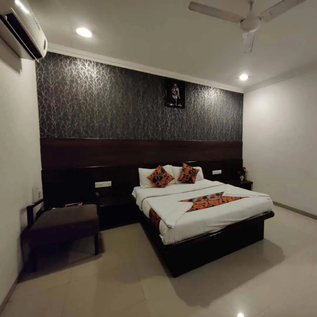 Bed in Hotel Shree Sai Wada