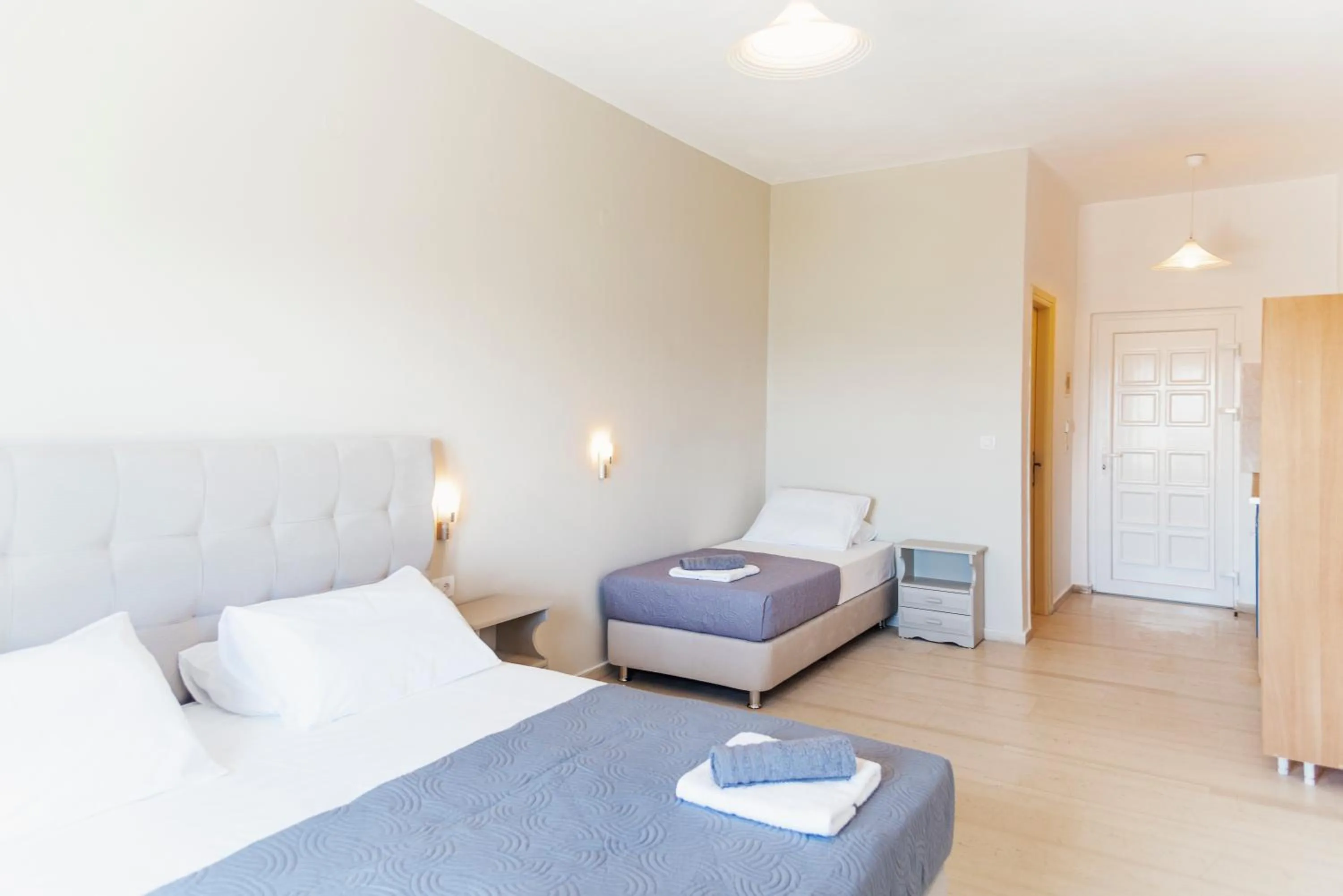 Bed in Ammos Apartments