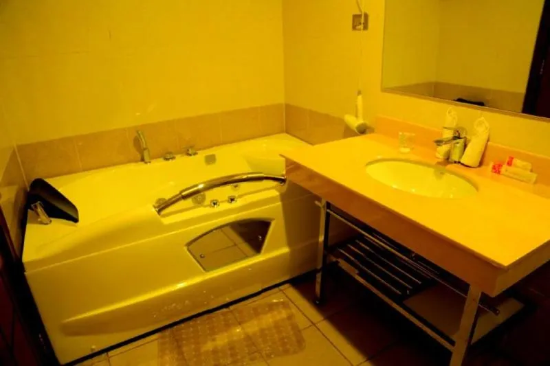 Bed in Ye Afoli International Hotel