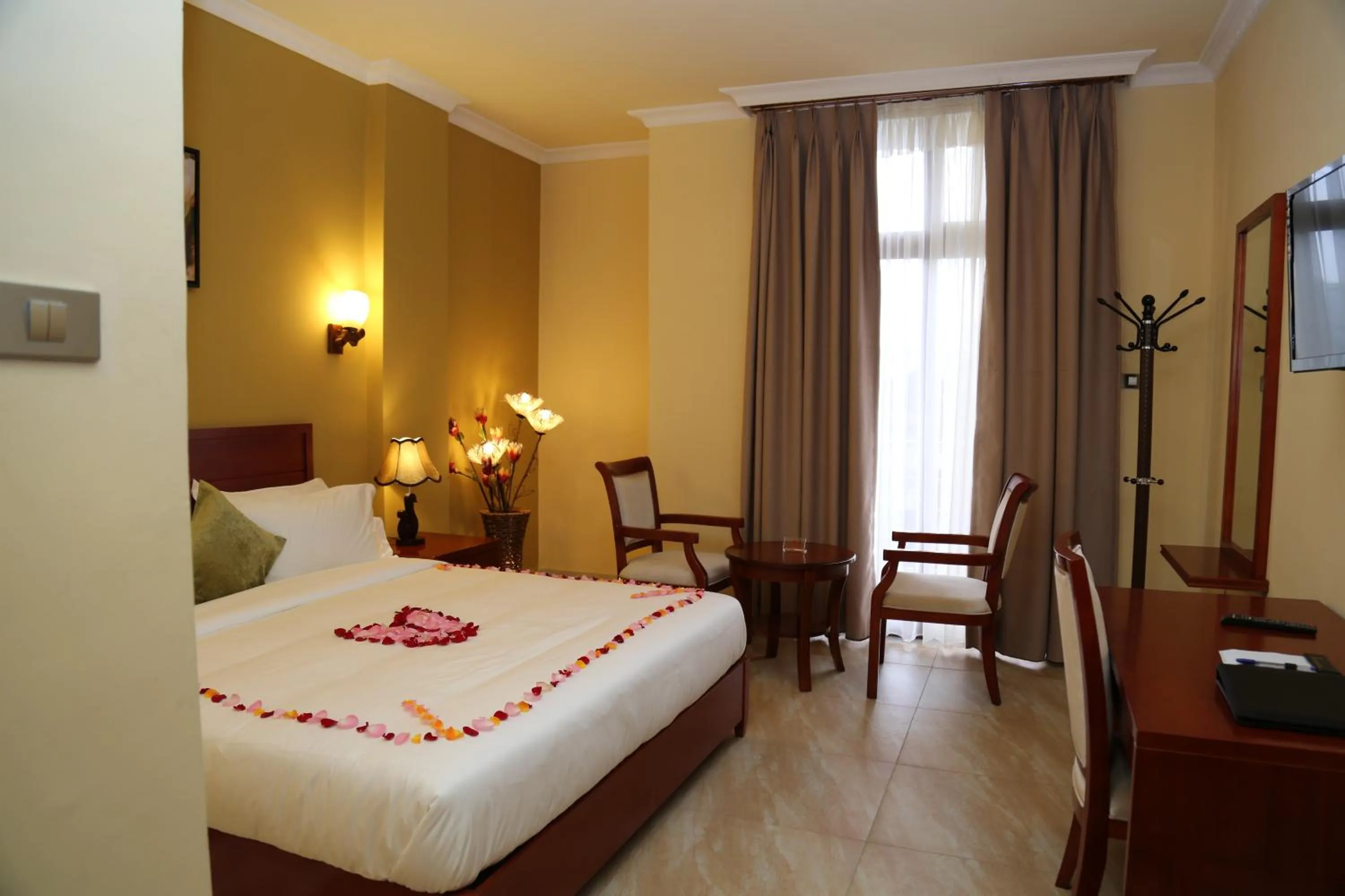 Photo of the whole room, Bed in Ye Afoli International Hotel