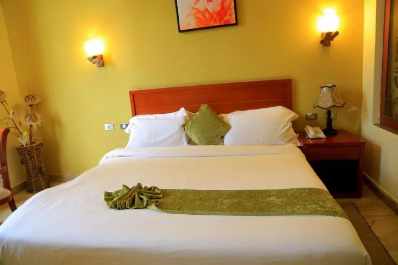 Bed in Ye Afoli International Hotel