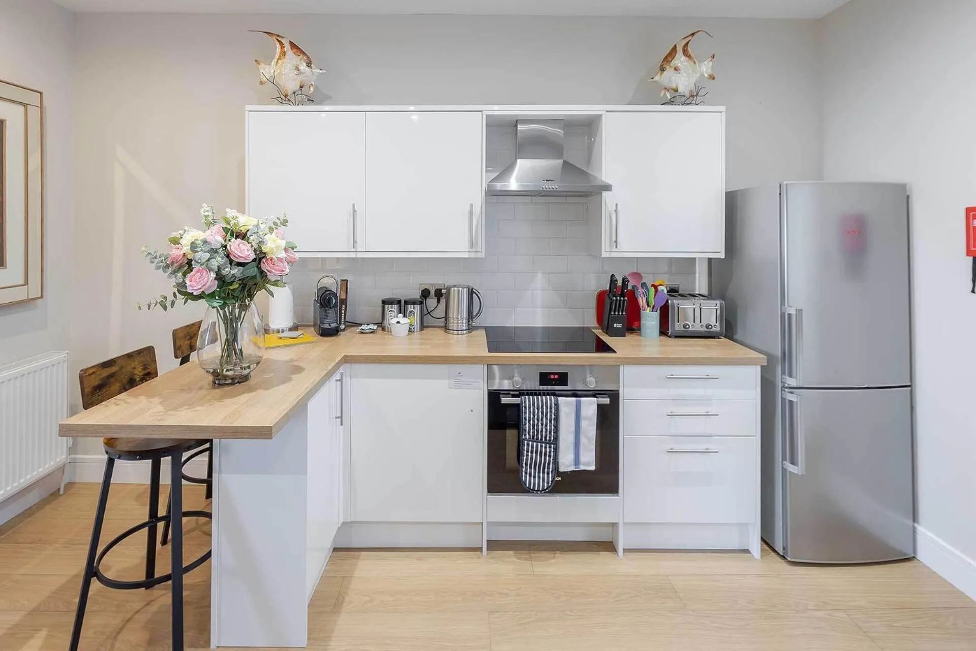 Kitchen or kitchenette in Carmel Apartments