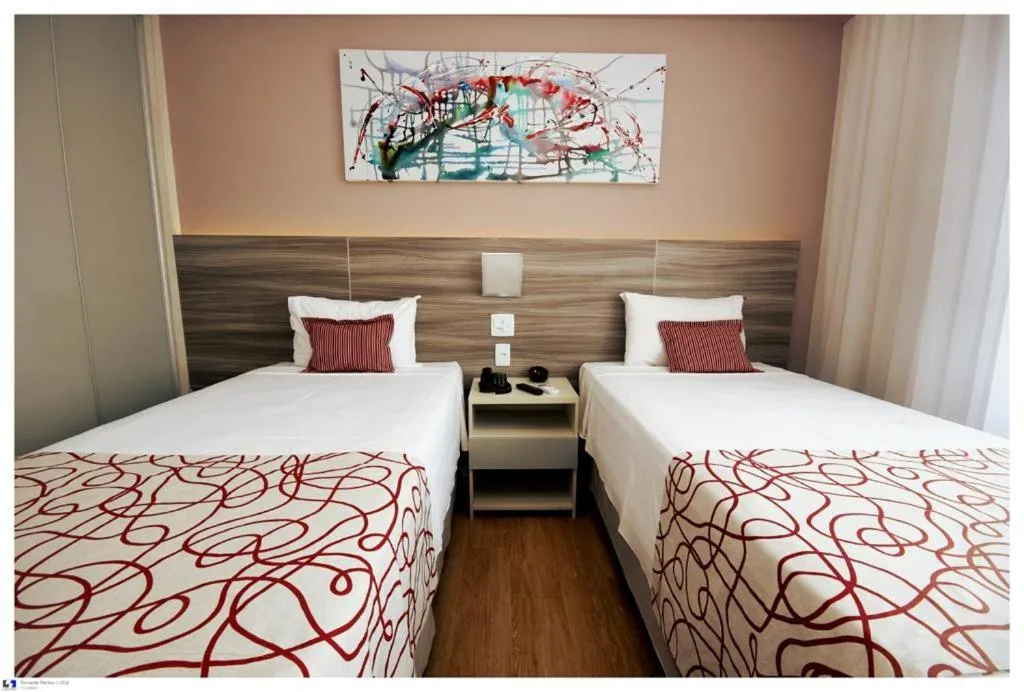 Bed in IT Itabira Hotel