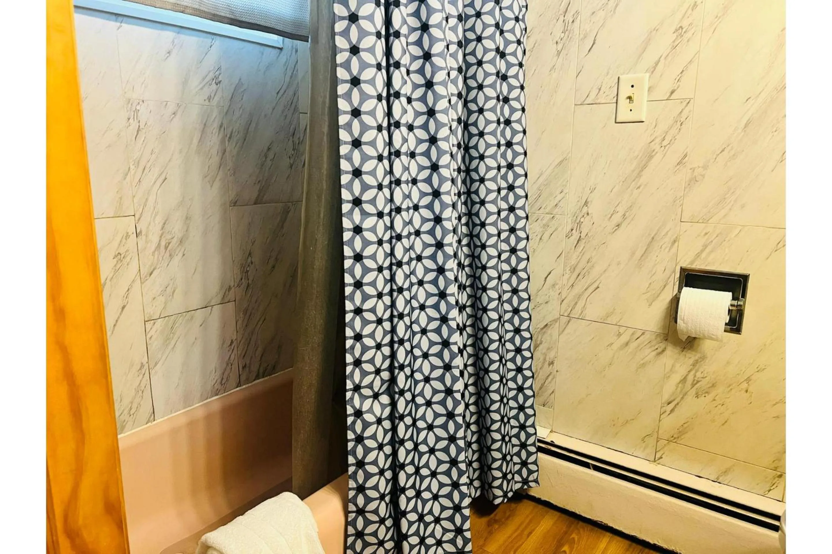 Bathroom in Wisconsin-Aire Motel By OYO Random Lake