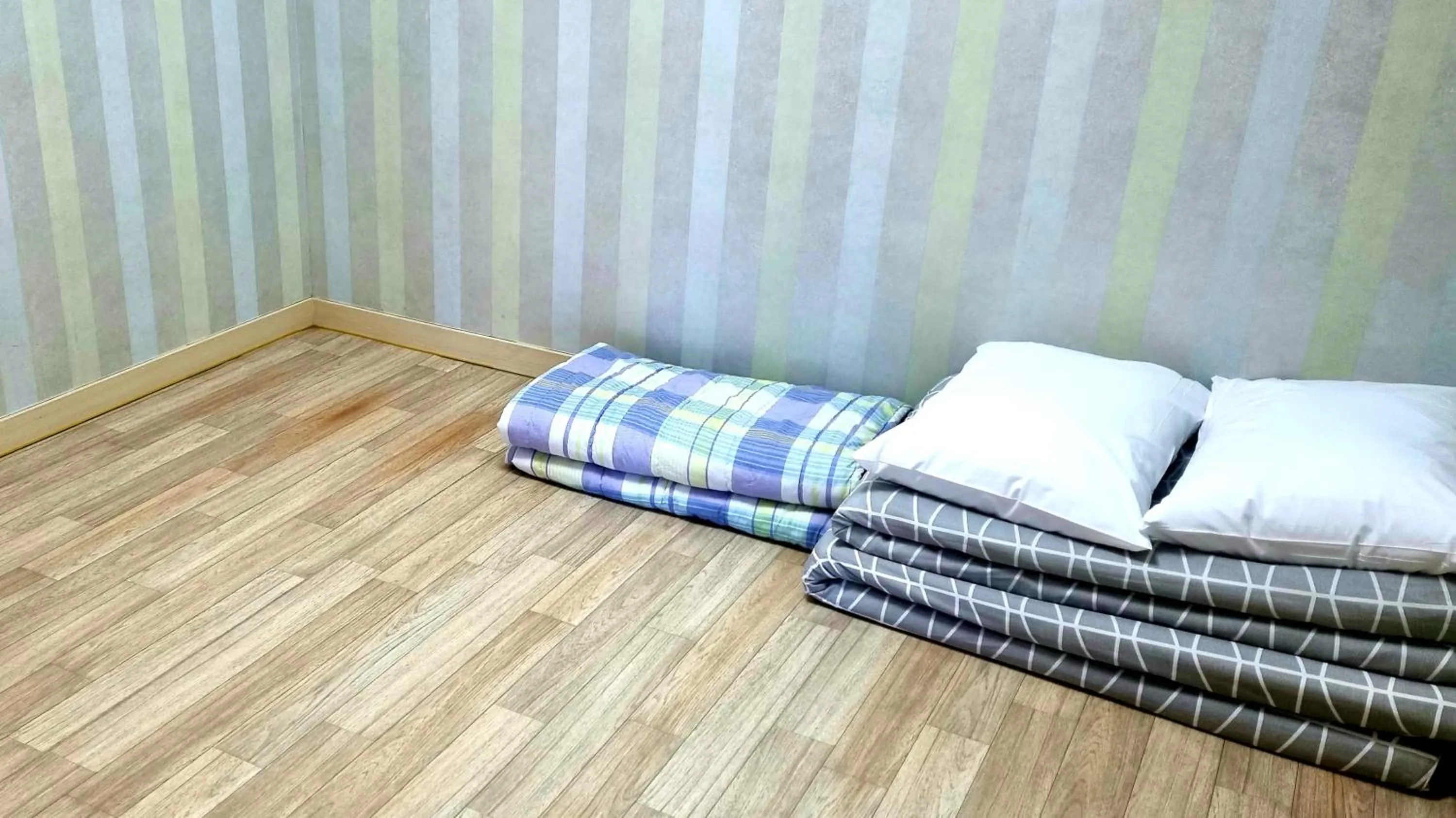 Bed in Hi Jeju Hotel