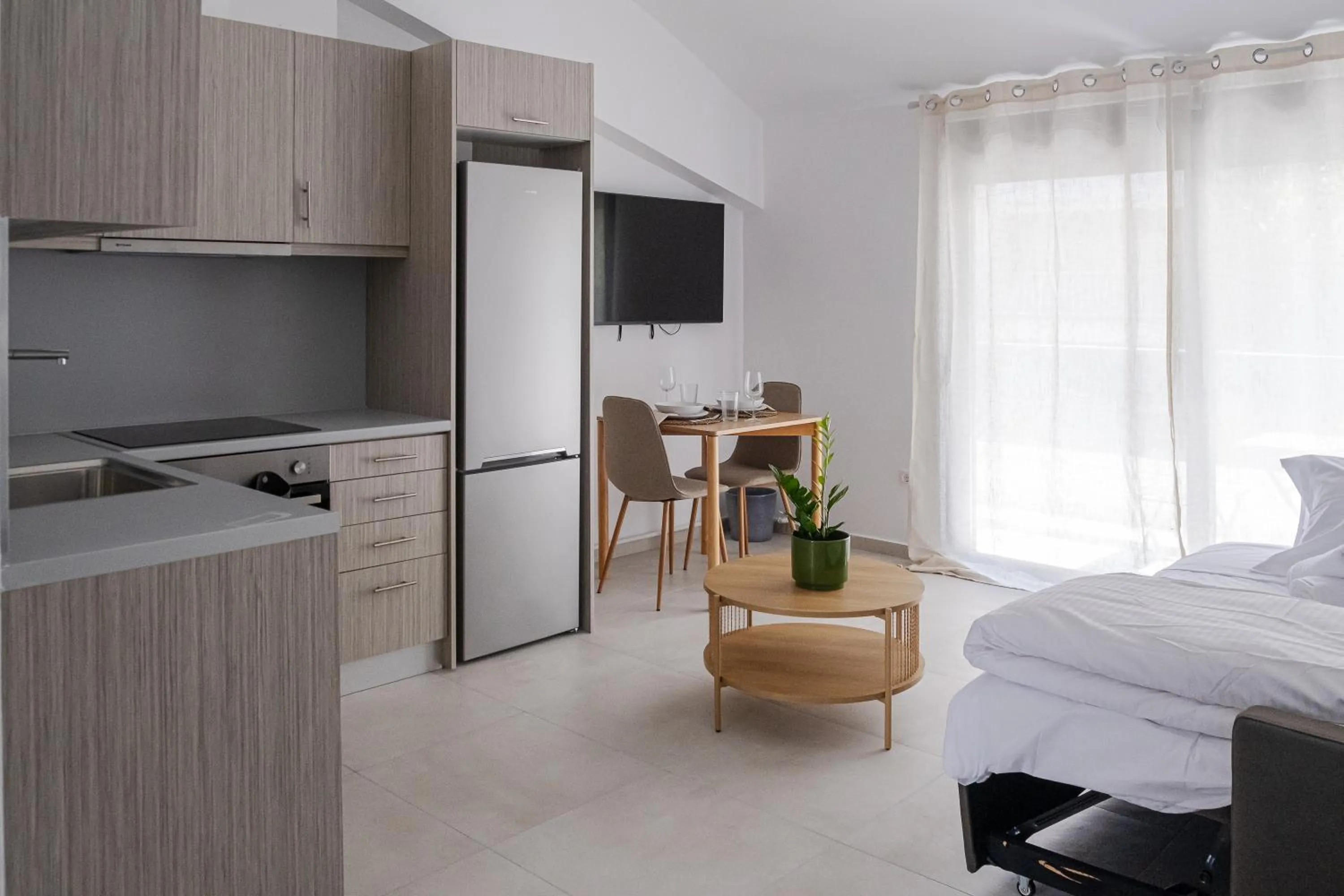 Communal lounge/ TV room, Bed in Noon Smart Residences