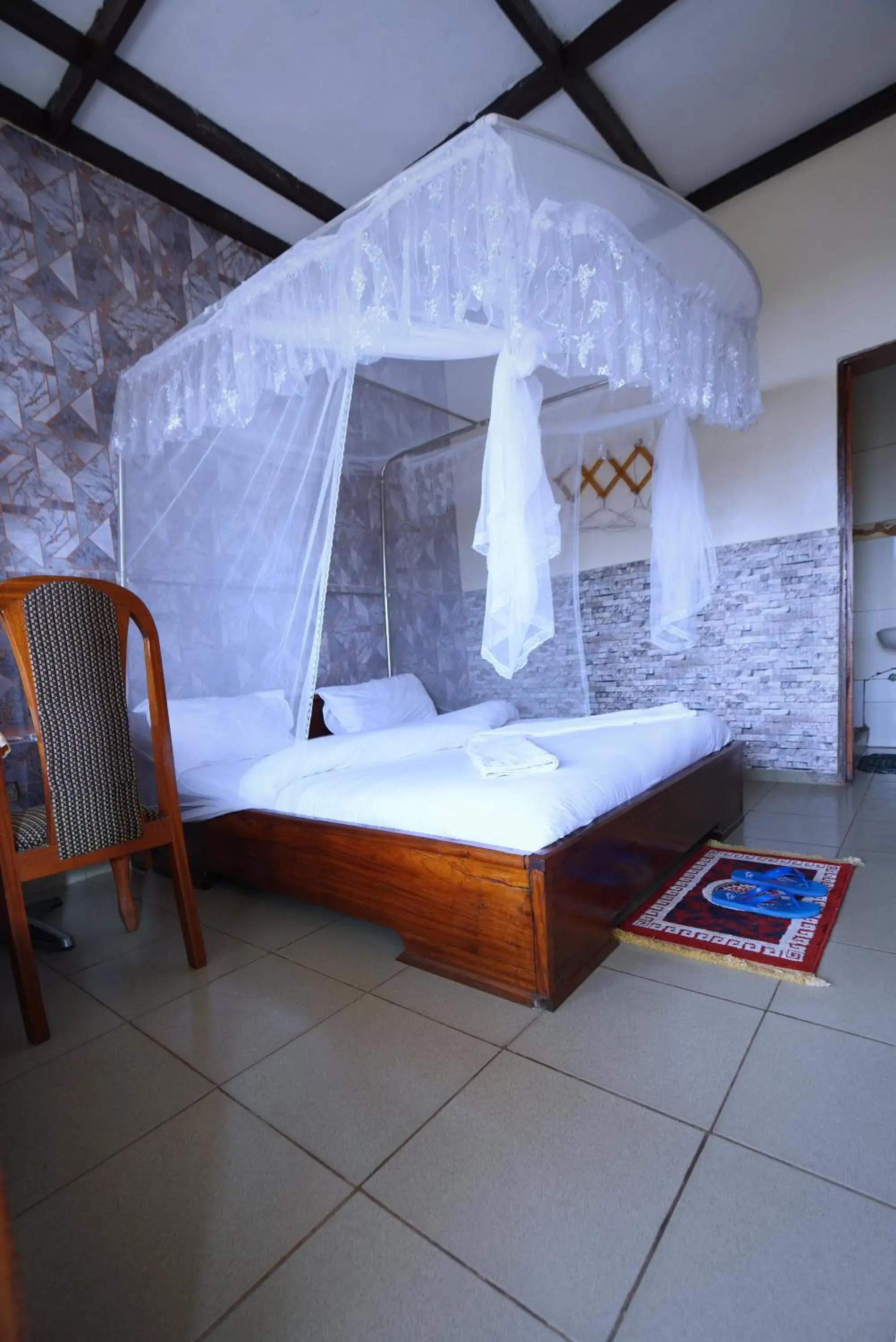 Deluxe Double Room with Balcony - single occupancy in Kivu Nest Hotel Deluxe Double Room with Balcony - single occupancy in Kivu Nest Hotel