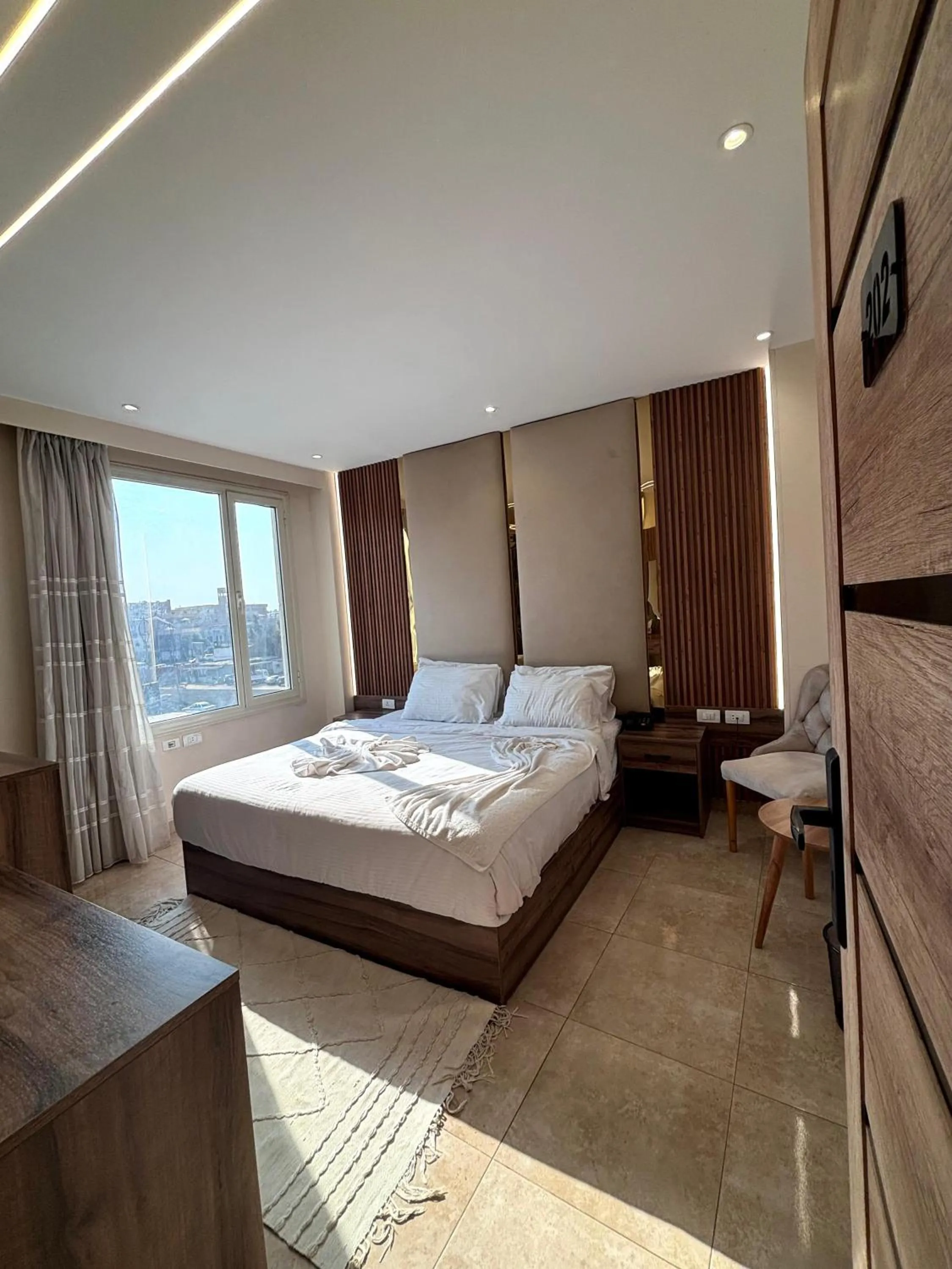 Photo of the whole room, Bed in The Palace Pyramids View Hotel