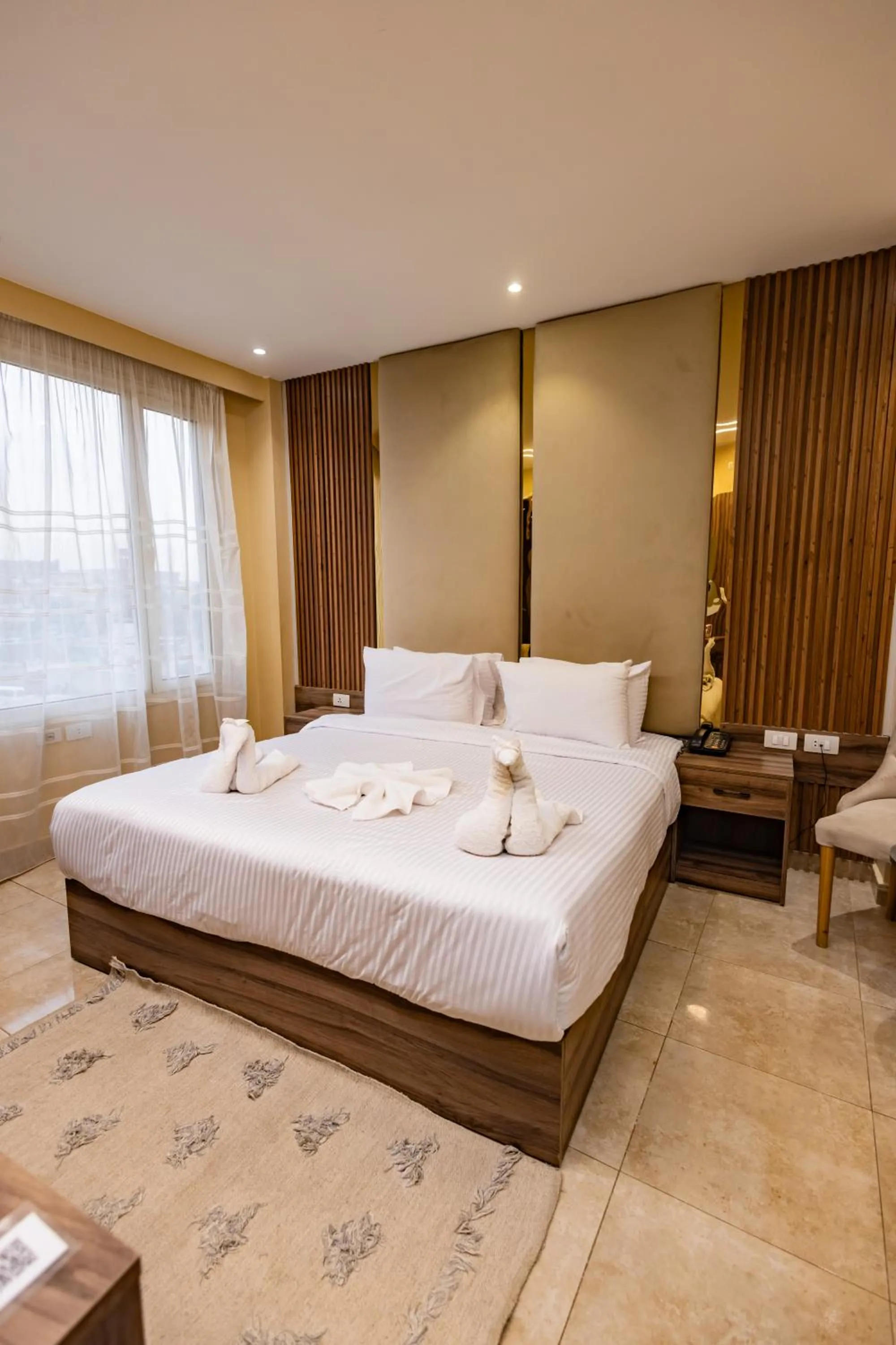 Bed in The Palace Pyramids View Hotel