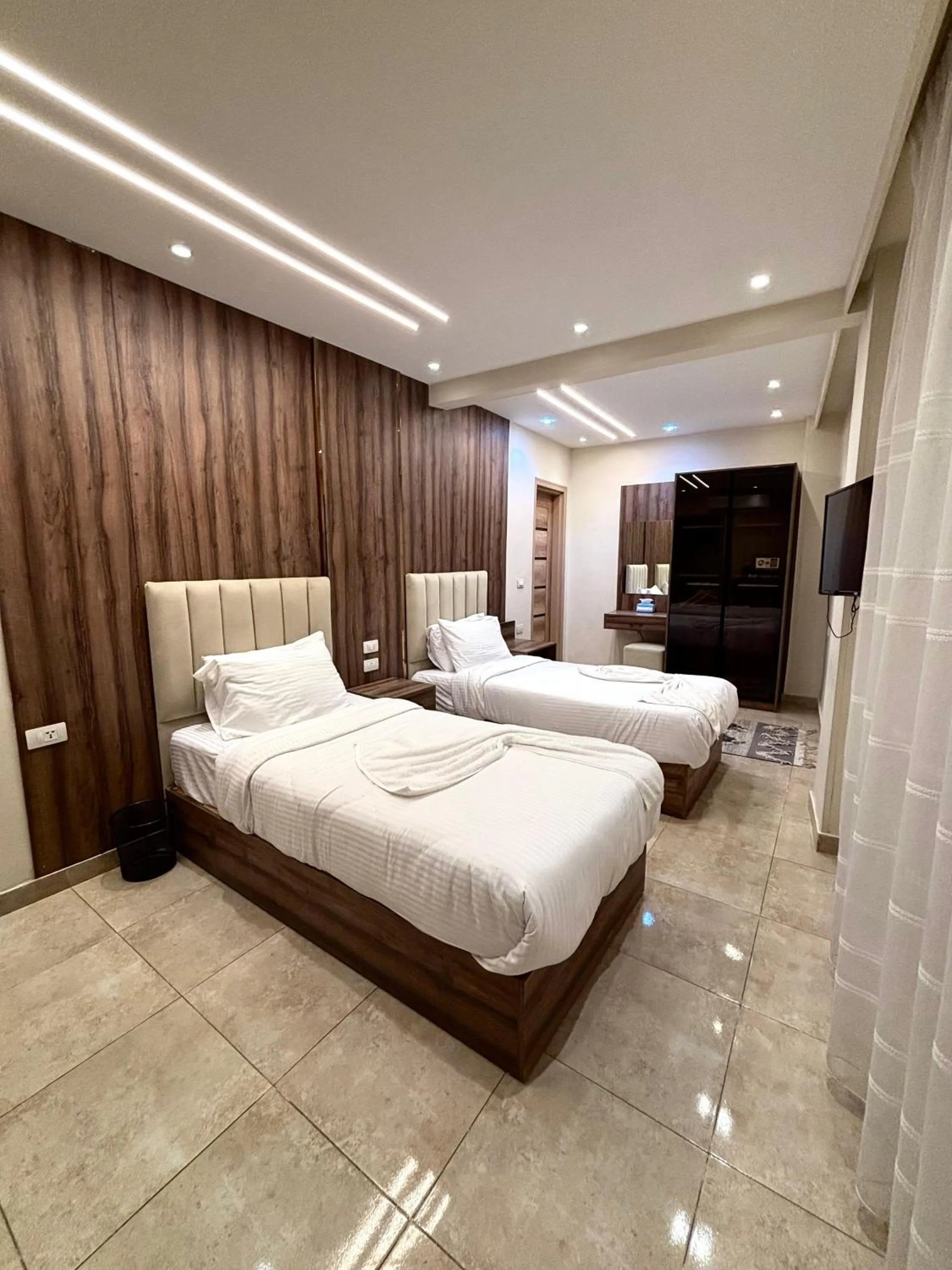 Bed in The Palace Pyramids View Hotel