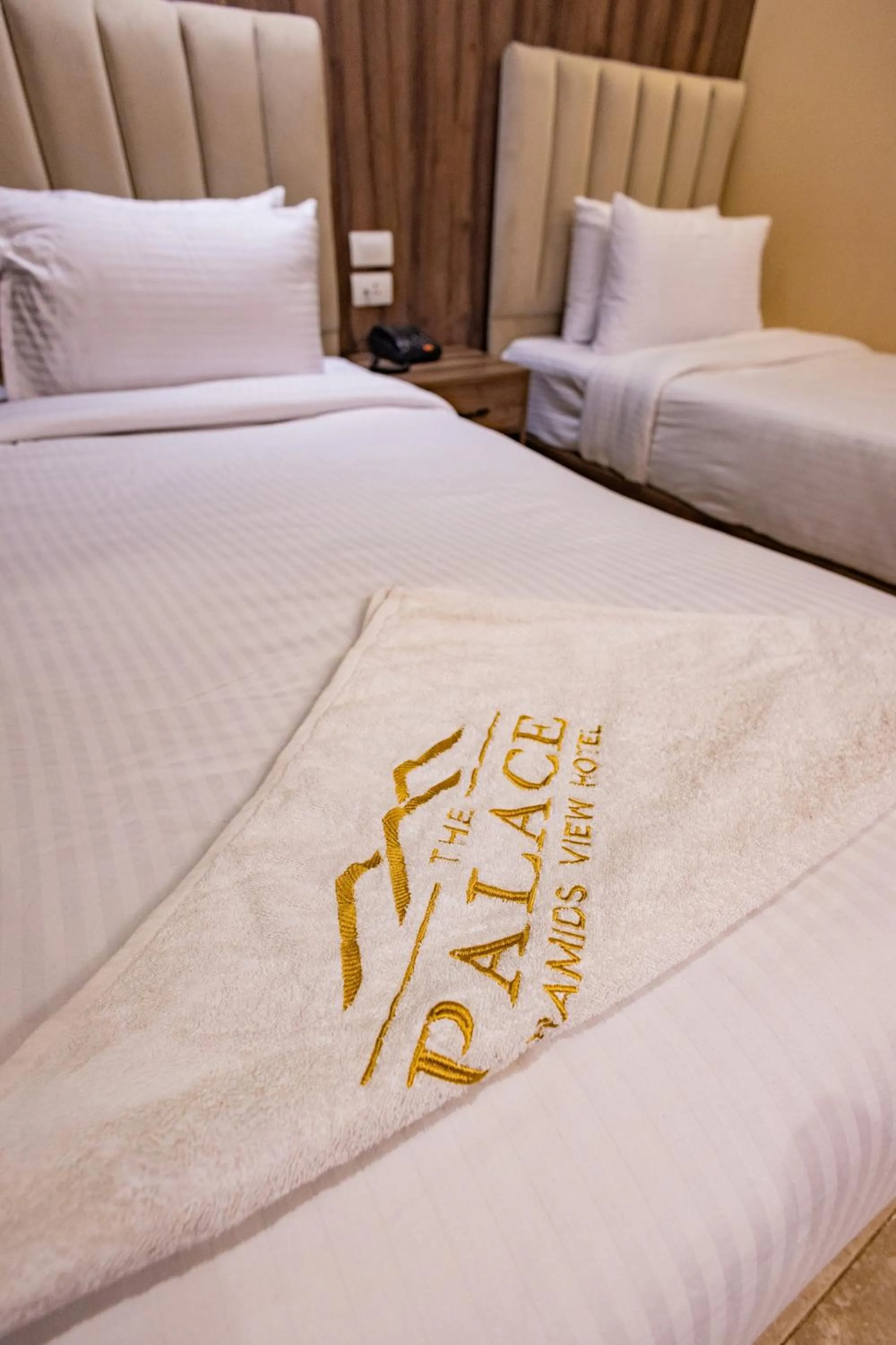 Bed in The Palace Pyramids View Hotel